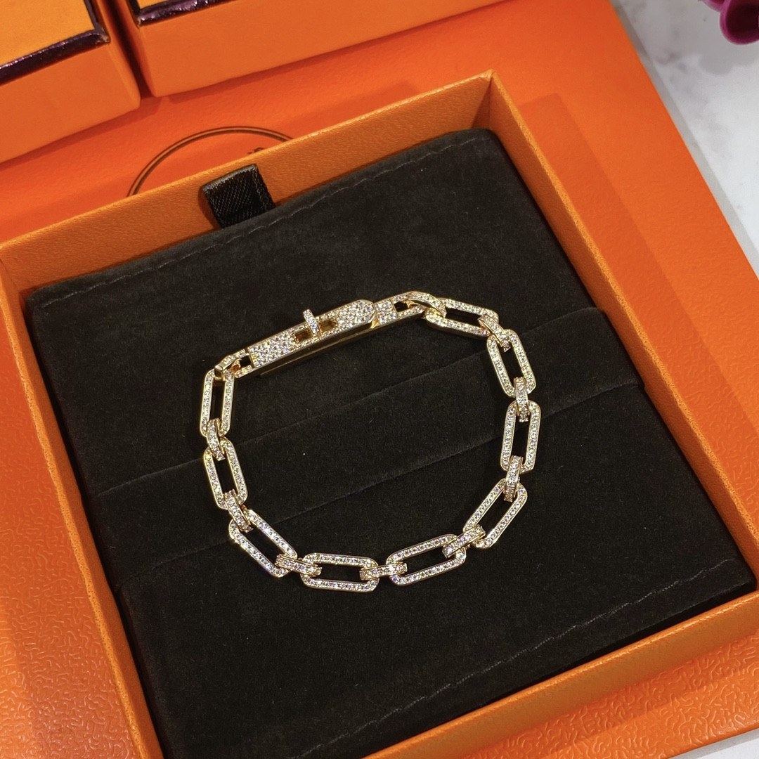 hermès fully Di*m*nd-encrusted kelly bracelet