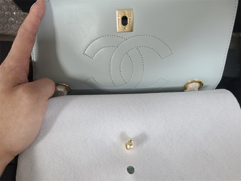 Ch*el flap bag with top handle 6.6 × 9.8 × 4.7 in