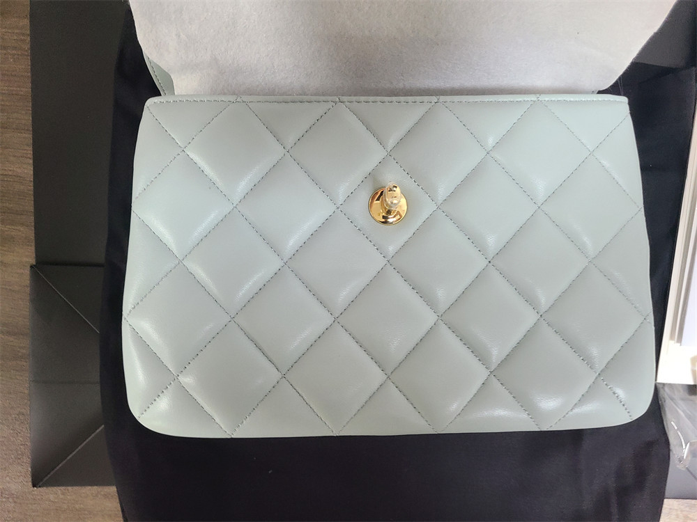 Ch*el flap bag with top handle 6.6 × 9.8 × 4.7 in