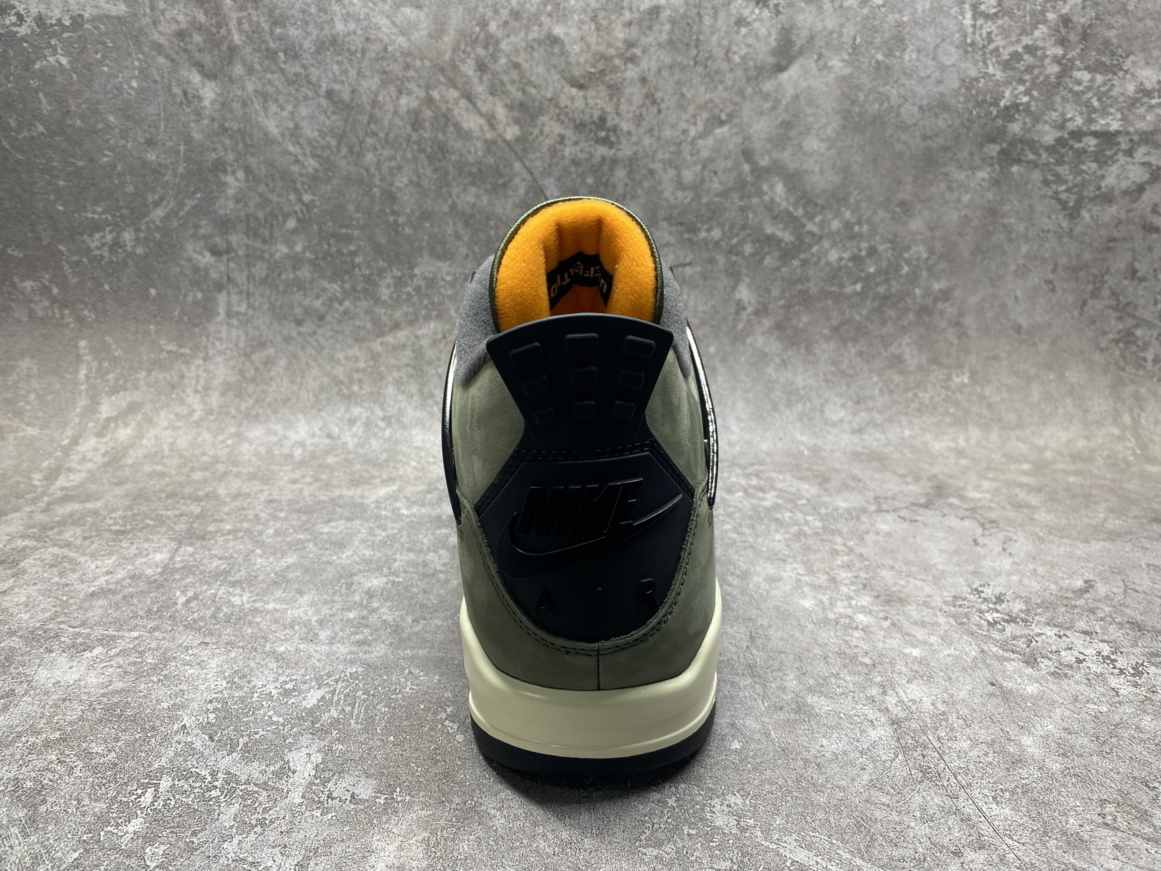 UA Jordan 4 Retro