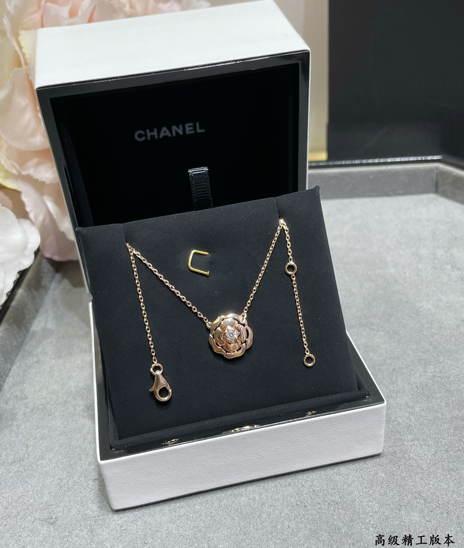 Ch*el camellia japonica necklace