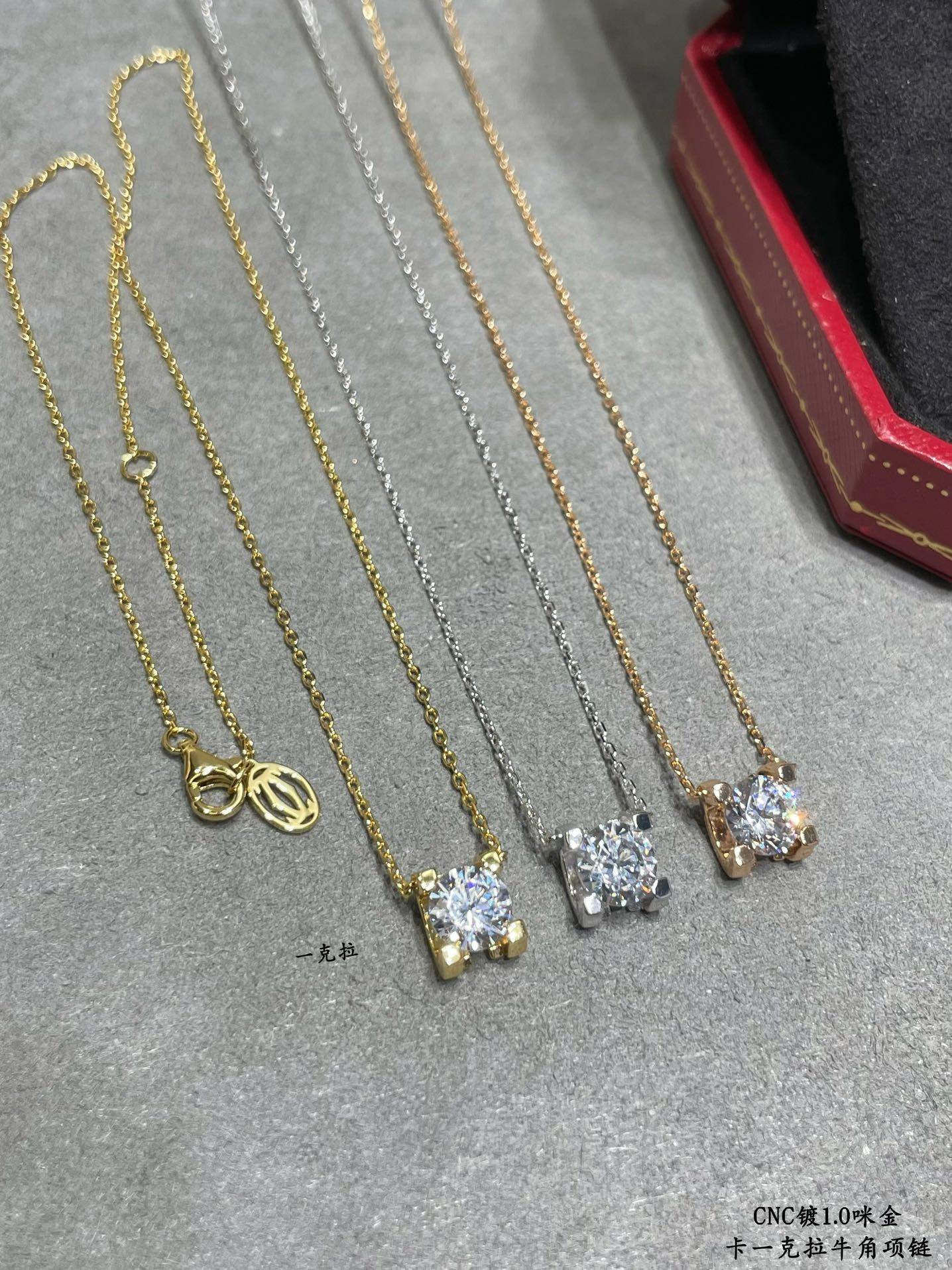 Ca*t*er one carat horn necklace