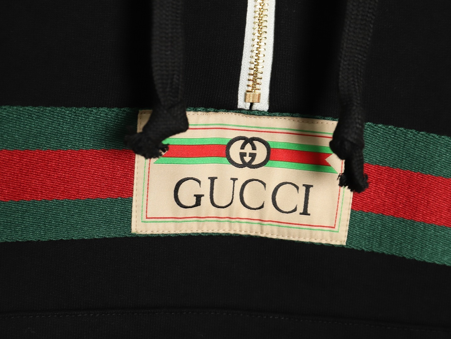 G*u*i hoodies