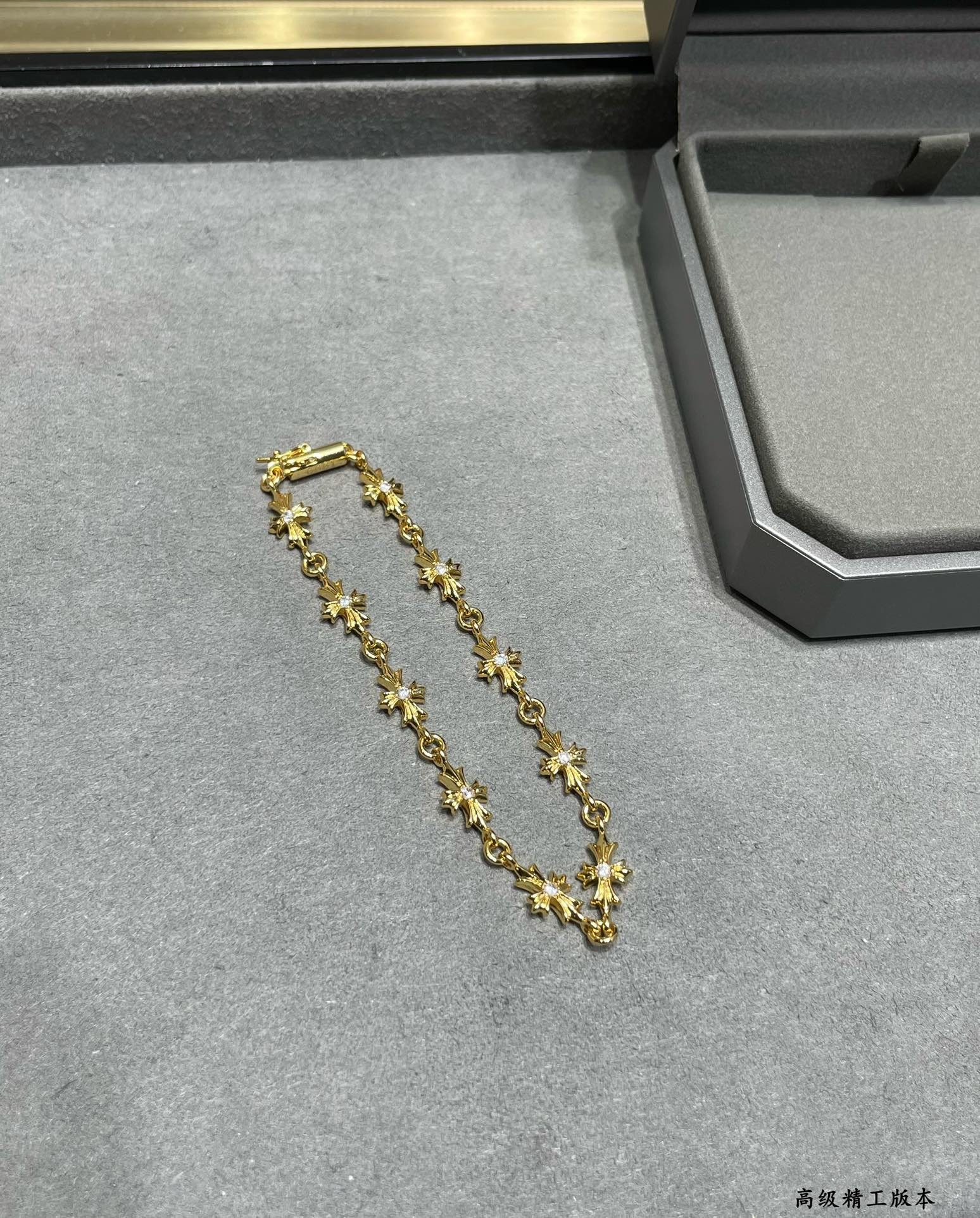 Ch**me He**ts cross bracelet