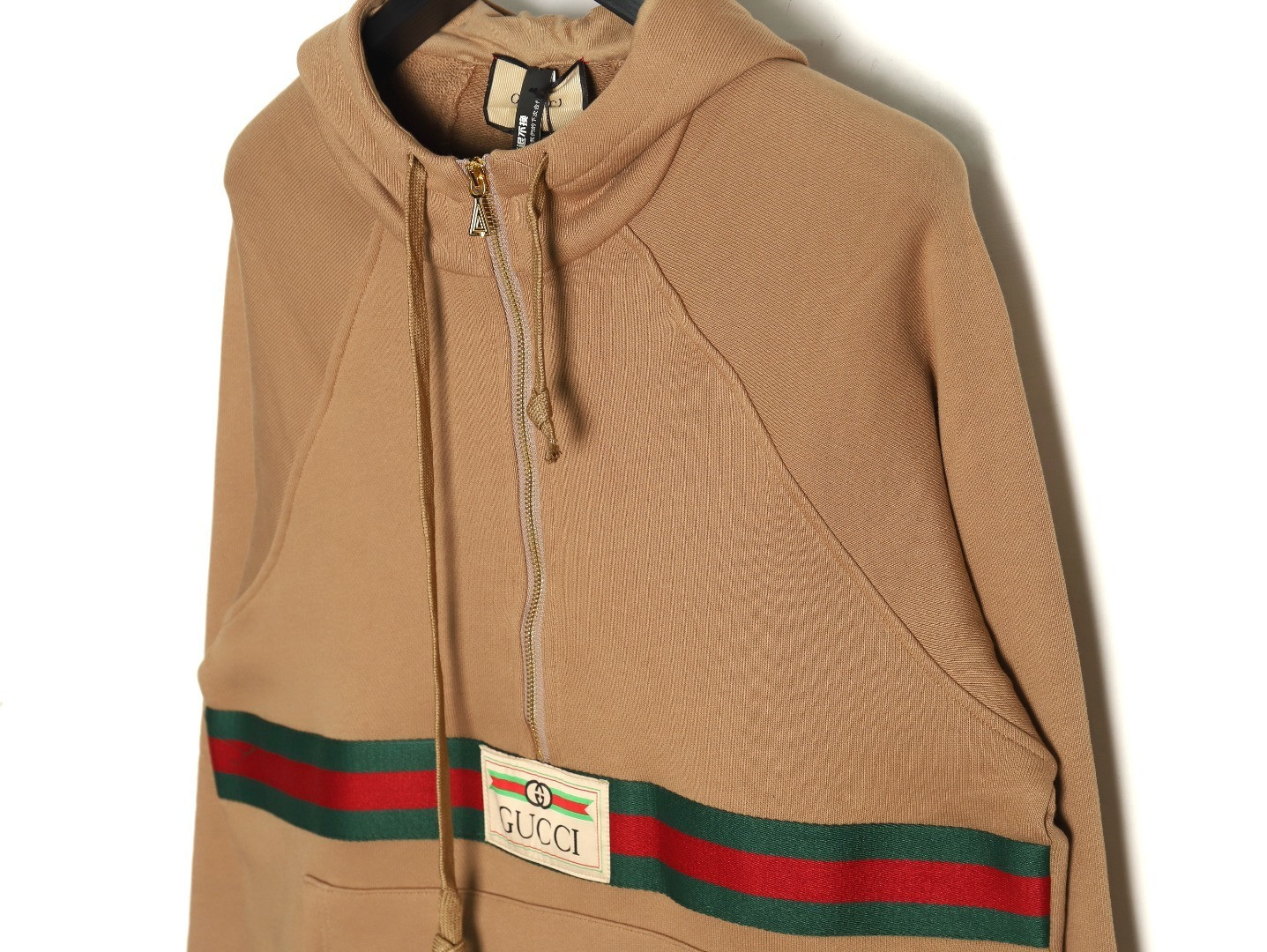 G*u*i hoodies