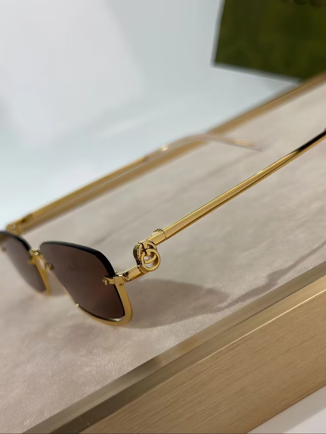 G*u*i sunglasses