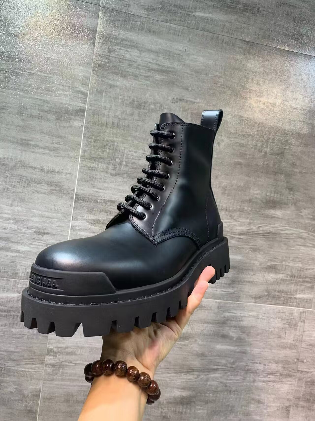 ua Ba*len*cia*ga strike lace-up boot in black