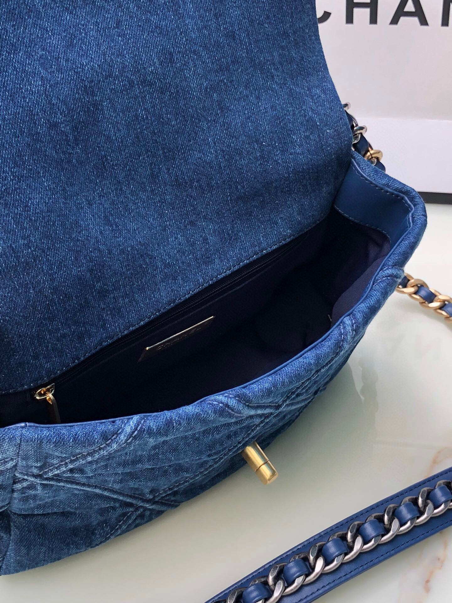 Ch*el 19 handbag ruthenium-finish metal navy 6.2 × 10.1 × 3.5 in