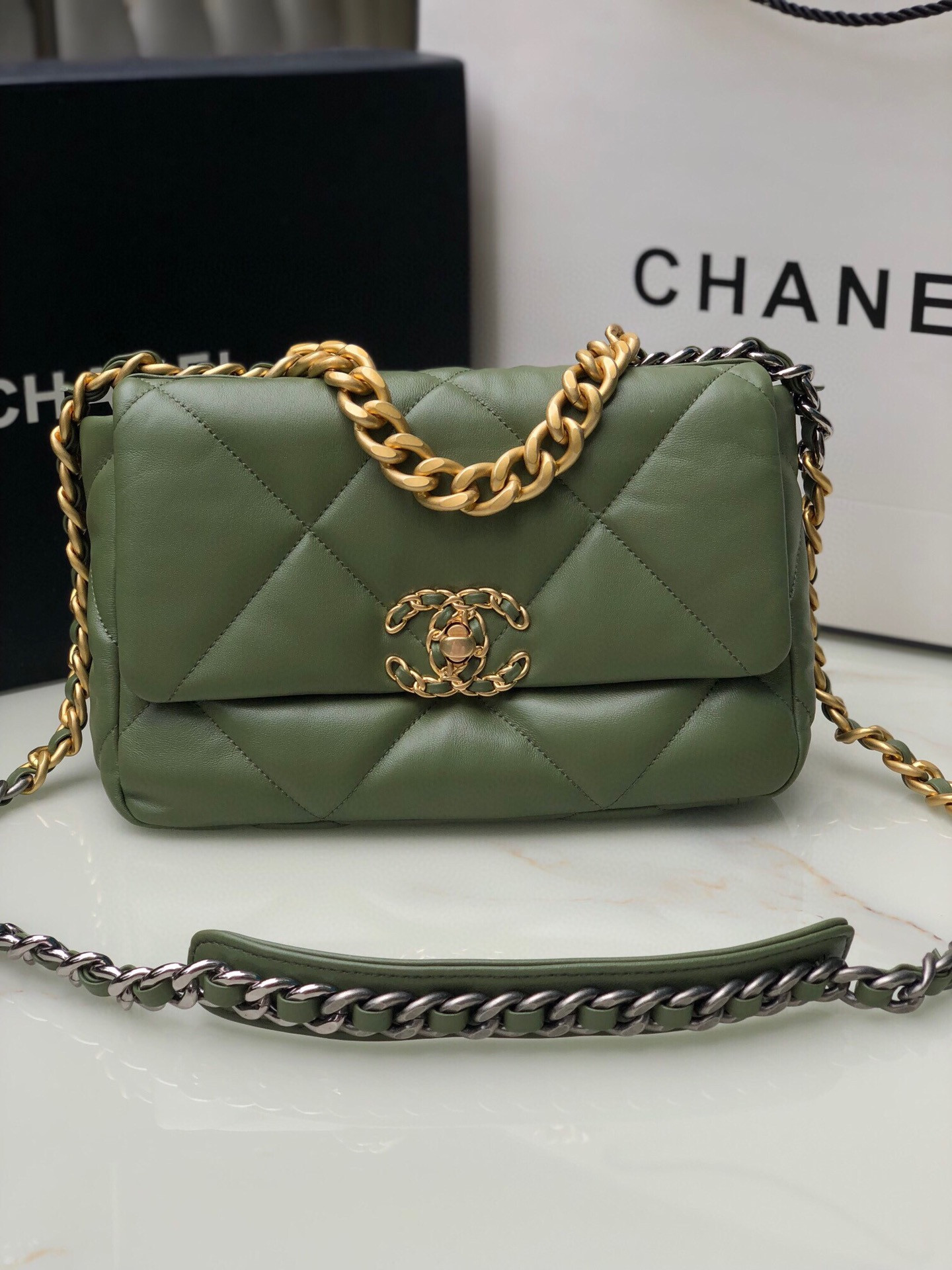 Ch*el 19 handbag shiny leather, gold-tone 16×26×9cm