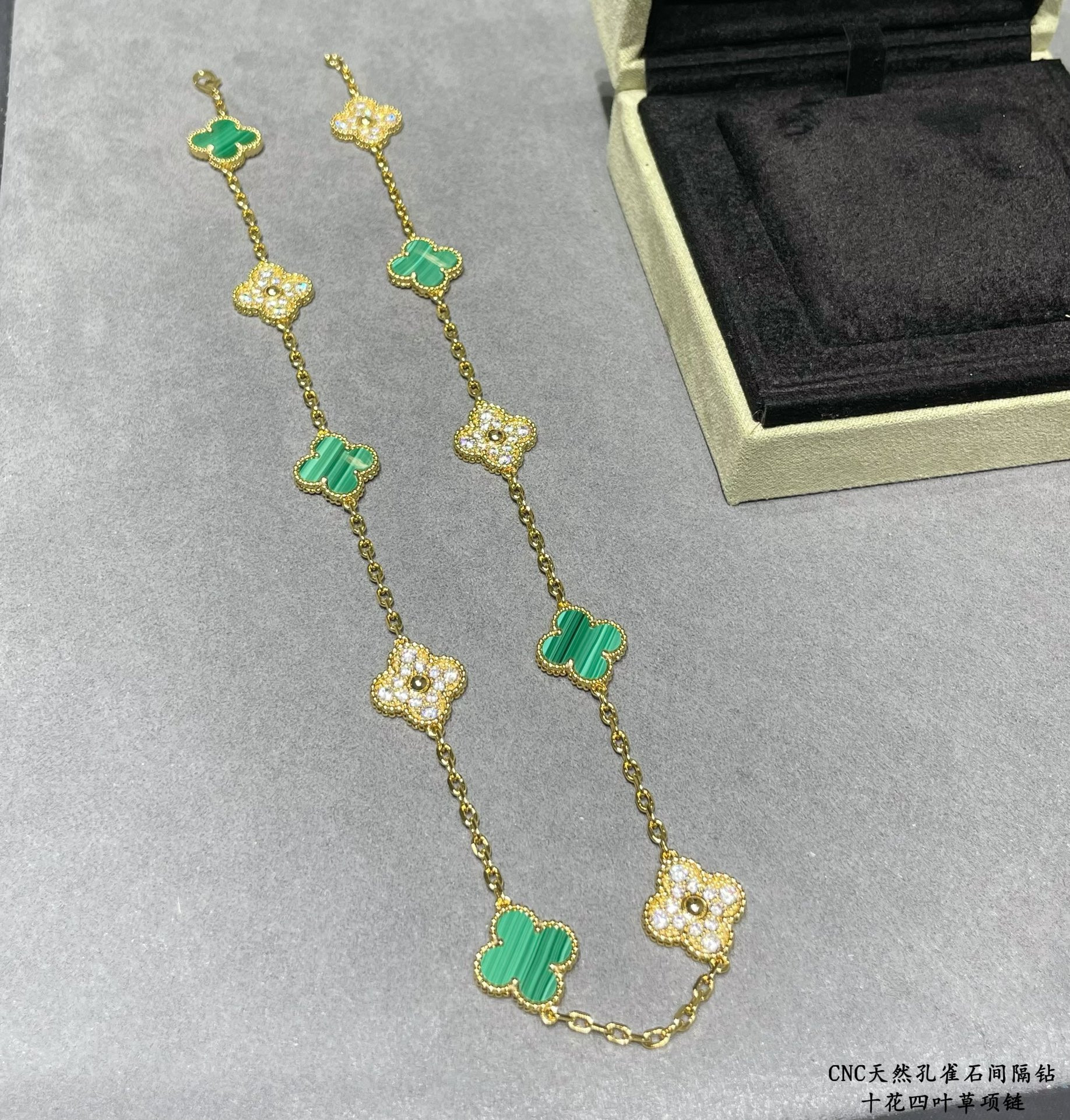 v*n cl*f & arpels natural malachite interval Di*m*nd ten flower four leaf clover necklace