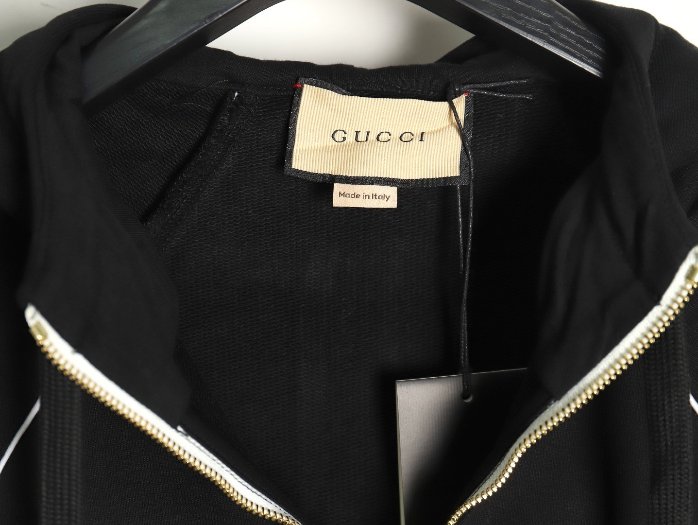 G*u*i hoodies