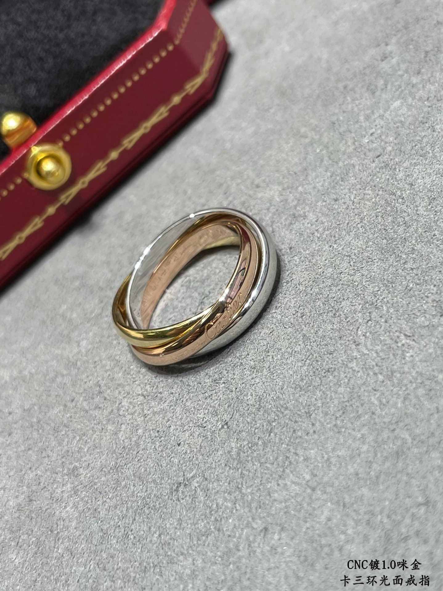 Ca*t*er three-ring polished ring