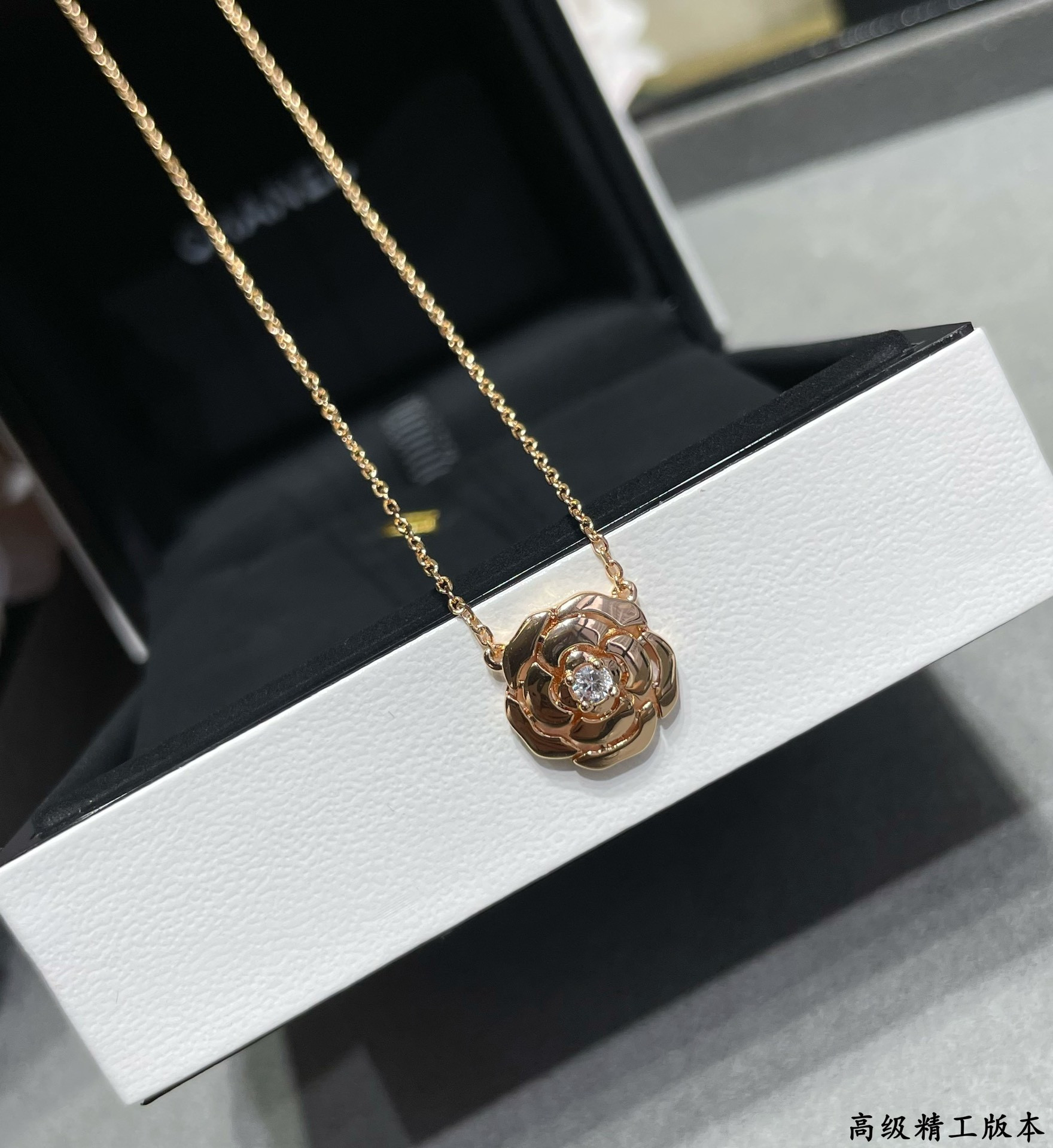 Ch*el camellia japonica necklace