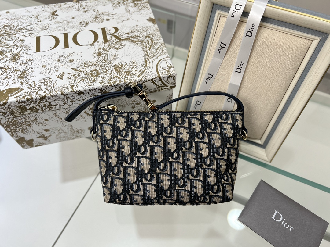 D*or travel nomad pouch blue D*or oblique jacquard