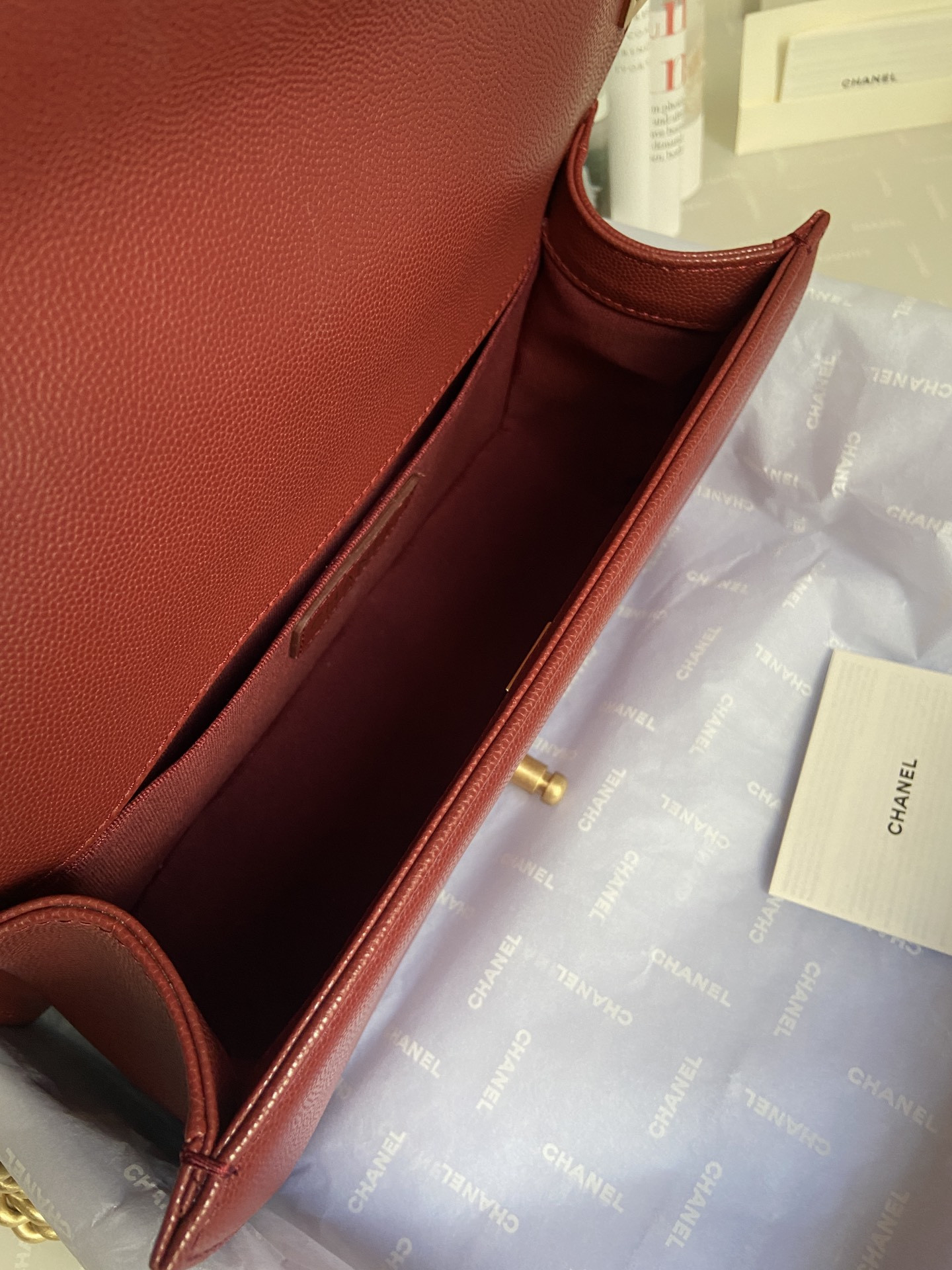 boy Ch*el handbag shiny grained calfskin & gold-tone metal red 5.9 × 9.8 × 3.5 in