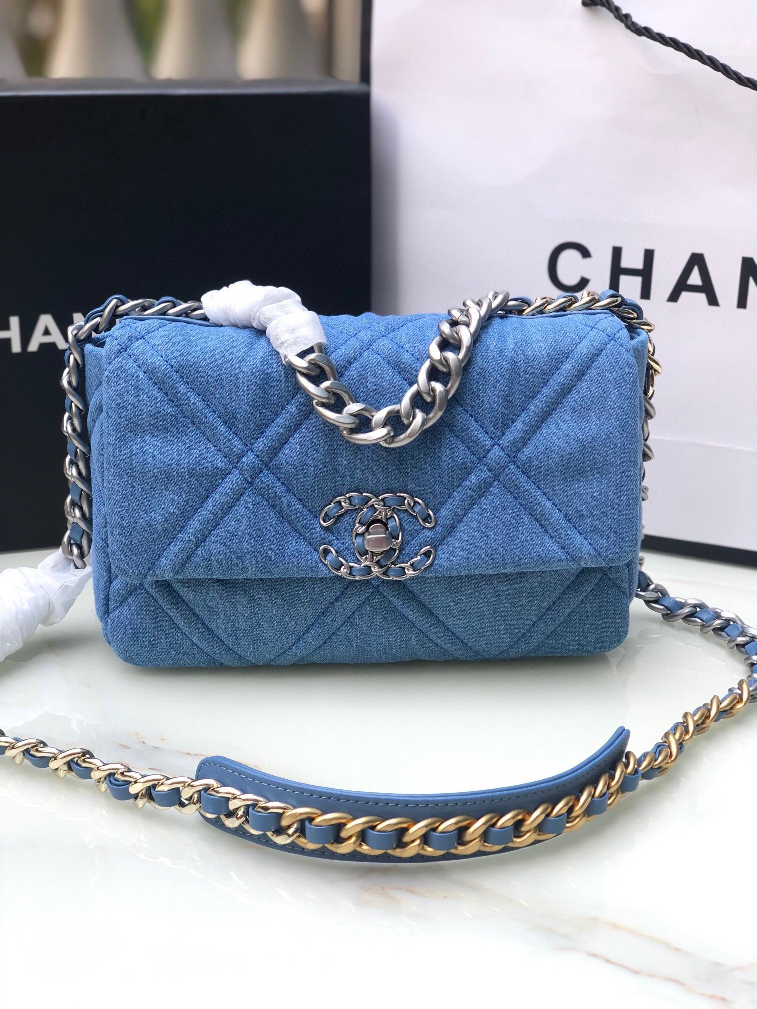 Ch*el 19 handbag, gold-tone, silver-tone & ruthenium-finish metal blue 6.2 × 10.1 × 3.5 in