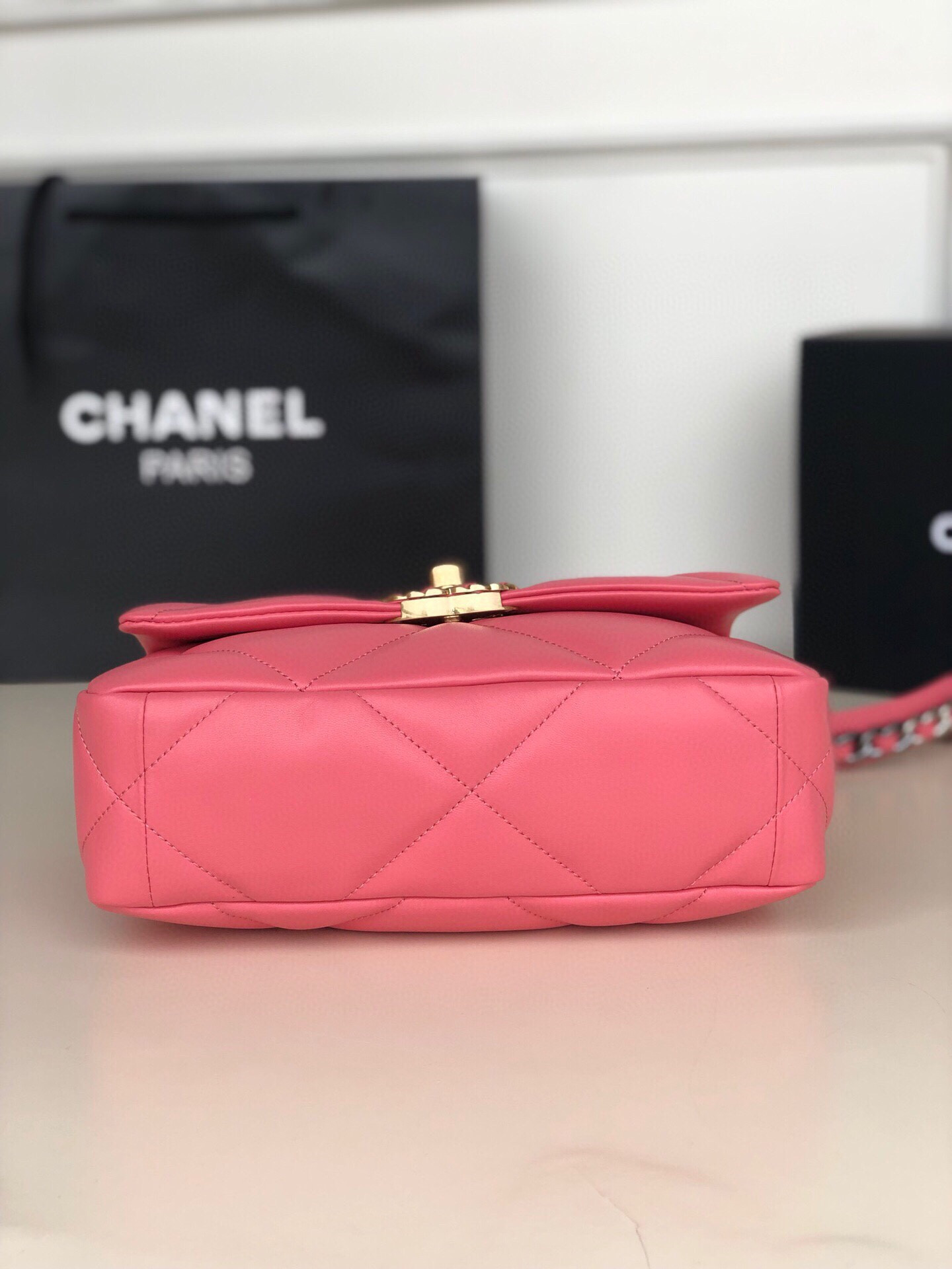 Ch*el 19 handbag shiny leather, gold-tone, silver-tone & ruthenium-finish metal pink 6.2 × 10.1 × 3.5 in