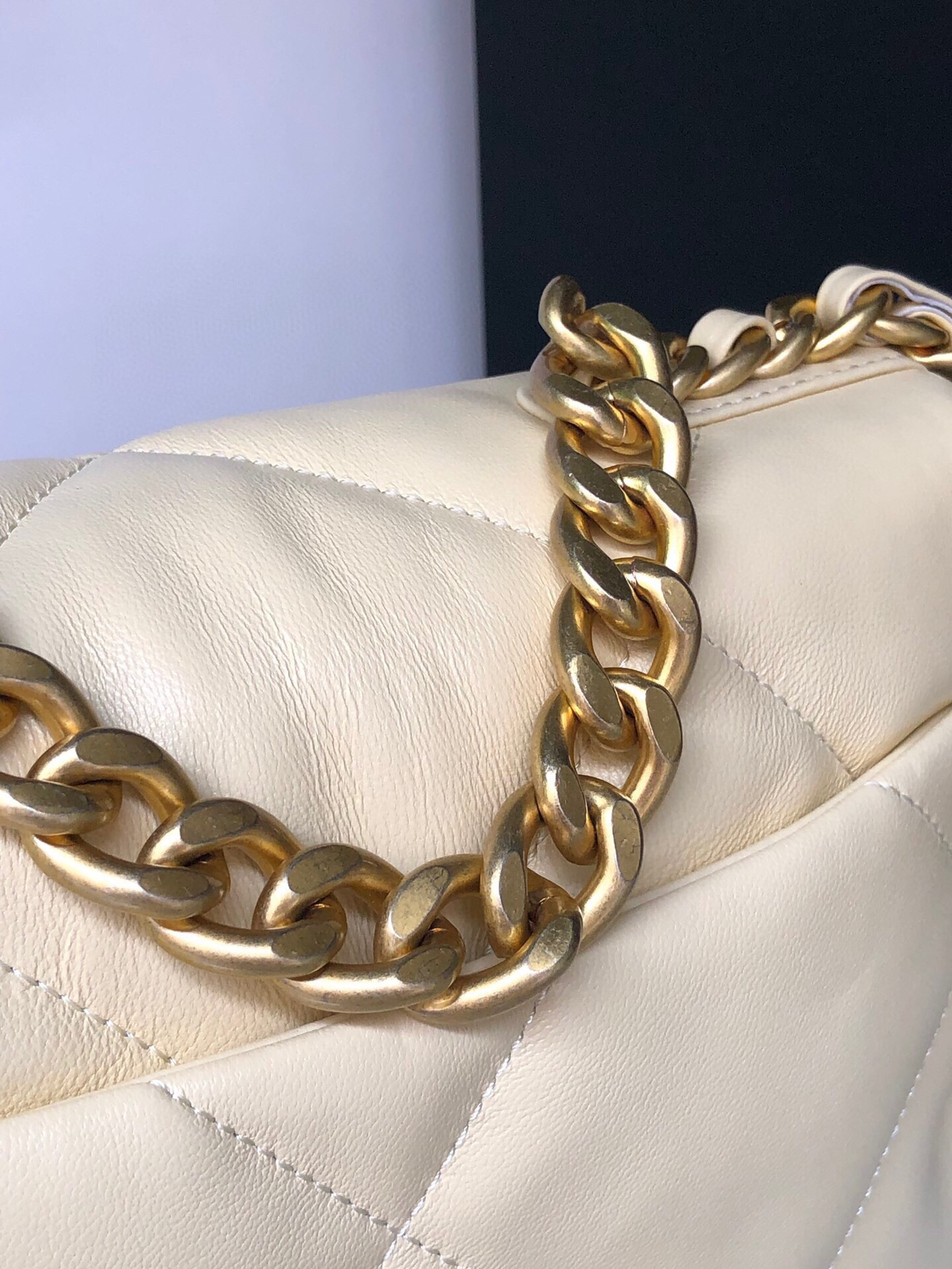 Ch*el 19 handbag shiny leather, gold-tone, silver-tone & ruthenium-finish metal dark yellow 6.2 × 10.1 × 3.5 in