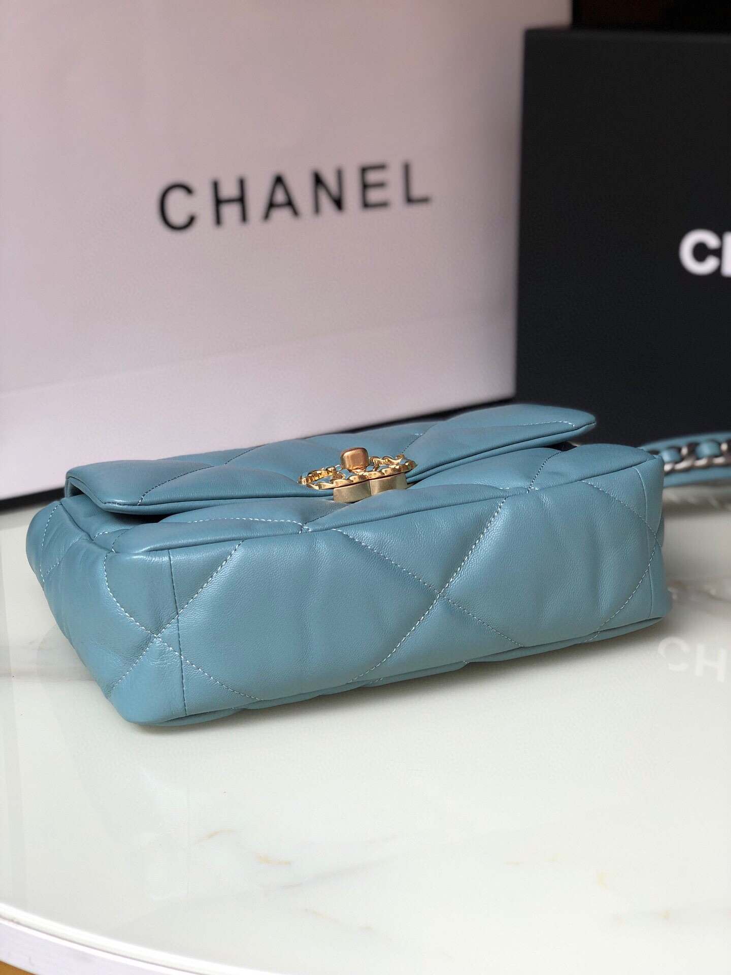 Ch*el 19 handbag shiny leather, gold-tone, silver-tone & ruthenium-finish metal blue 6.2 × 10.1 × 3.5 in