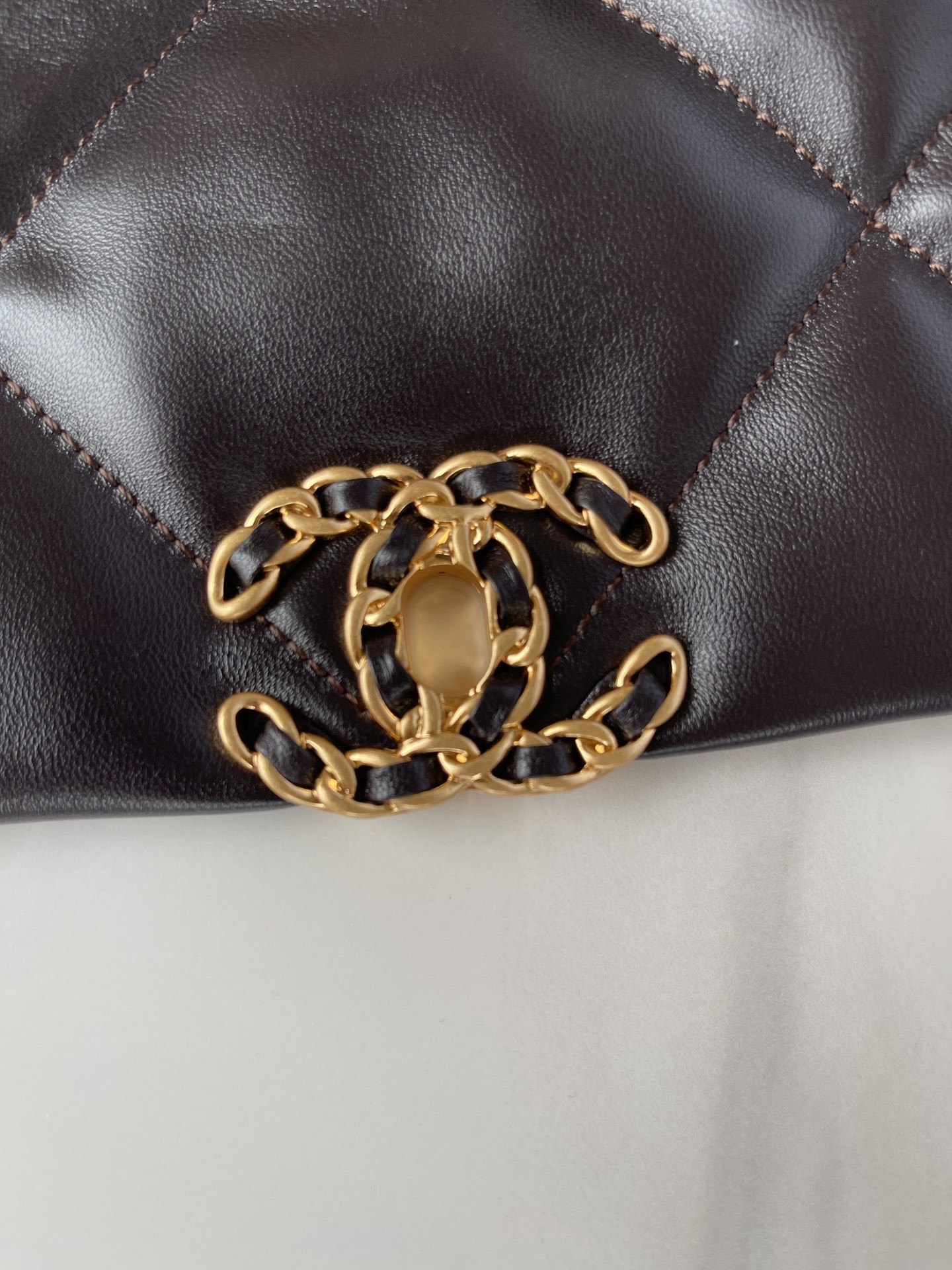 Ch*el 19 large handbag shiny leather, gold-tone, silver-tone & ruthenium-finish metal black 7.8 × 11.7 × 3.9 in
