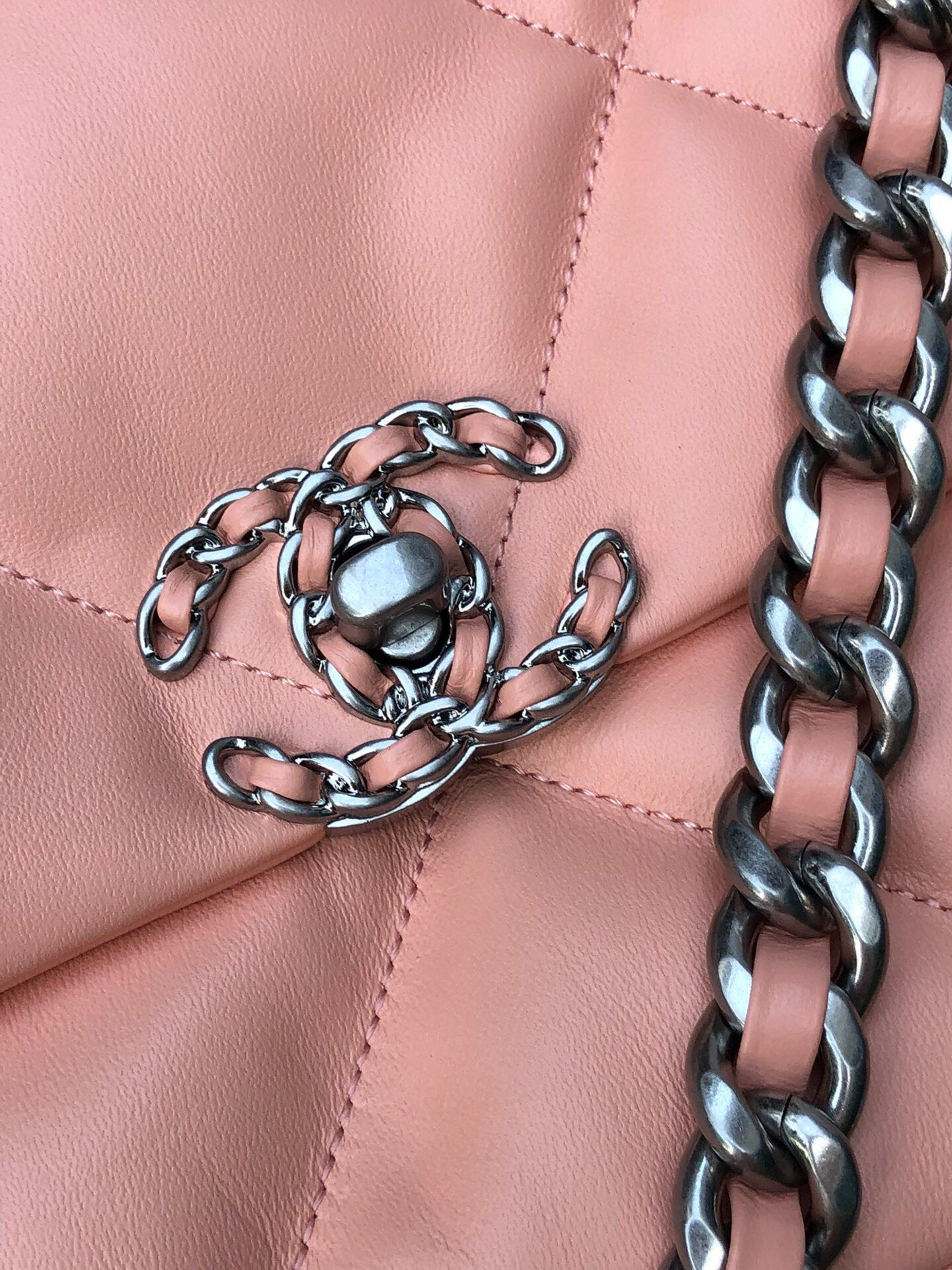 Ch*el 19 large handbag shiny leather, gold-tone, silver-tone & ruthenium-finish metal light pink 7.8 × 11.7 × 3.9 in