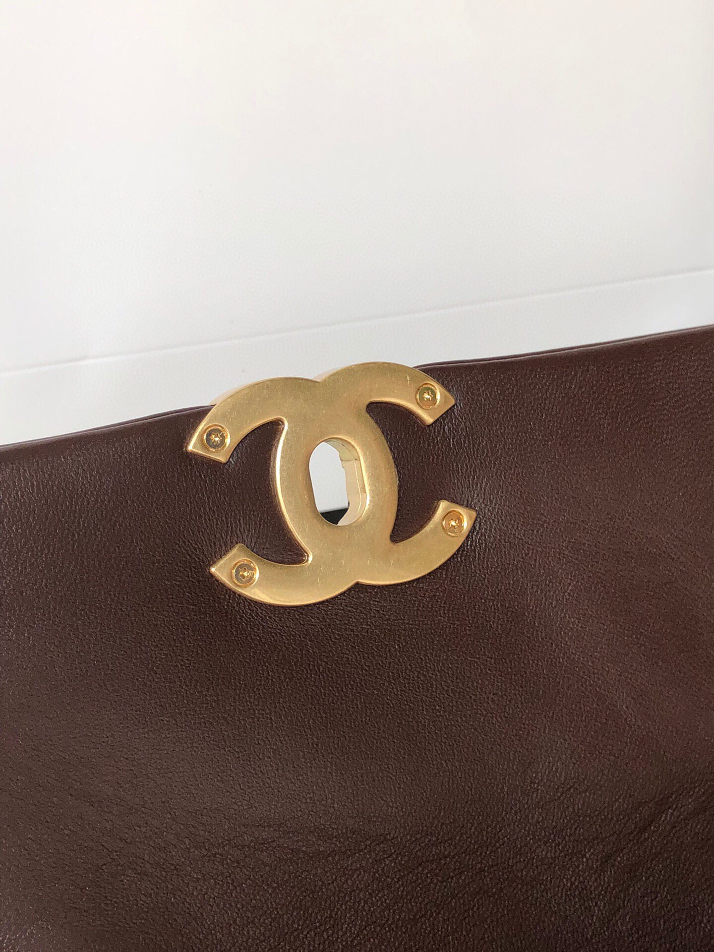 Ch*el 19 large handbag shiny leather, gold-tone, silver-tone & ruthenium-finish metal brown 7.8 × 11.7 × 3.9 in