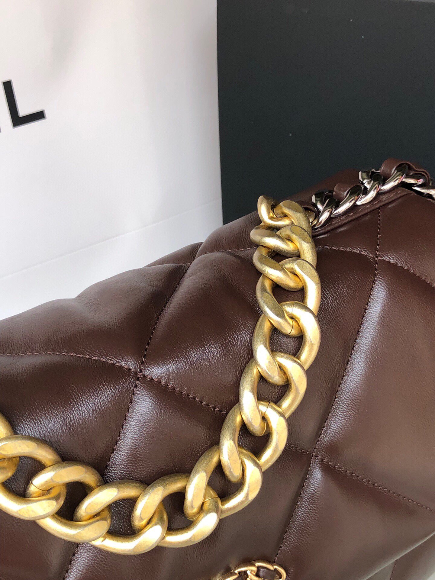 Ch*el 19 large handbag shiny leather, gold-tone, silver-tone & ruthenium-finish metal brown 7.8 × 11.7 × 3.9 in