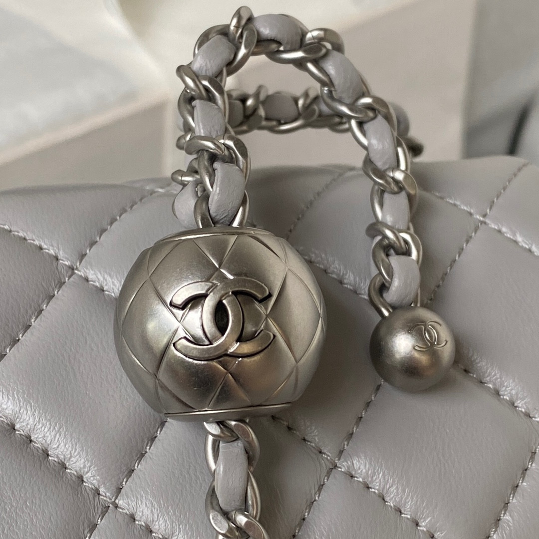 Ch*el mini flap bag shiny calfskin & silver-tone metal light gray 4.7 × 7.8 × 2.3 in