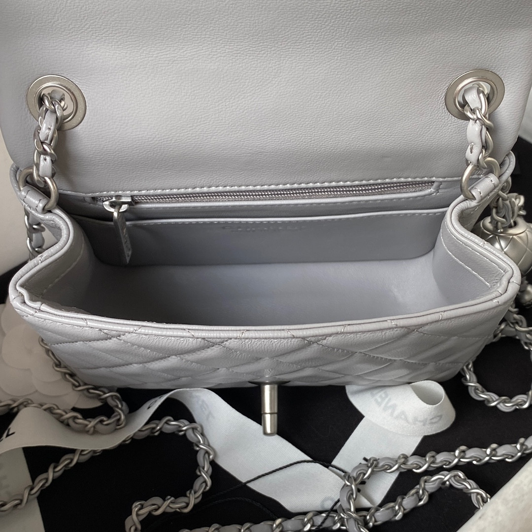 Ch*el mini flap bag shiny calfskin & silver-tone metal light gray 5.3 × 6.6 × 3.1 in