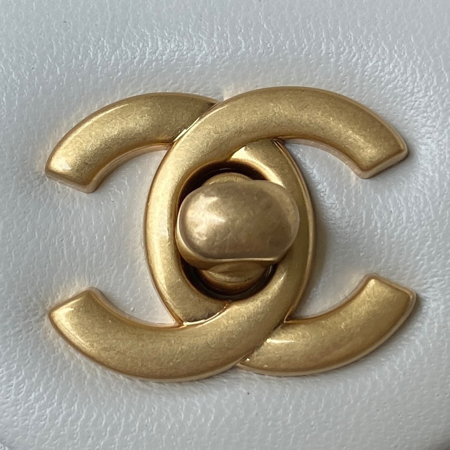Ch*el mini flap bag shiny calfskin & gold-tone metal white 4.7 × 7.8 × 2.3 in