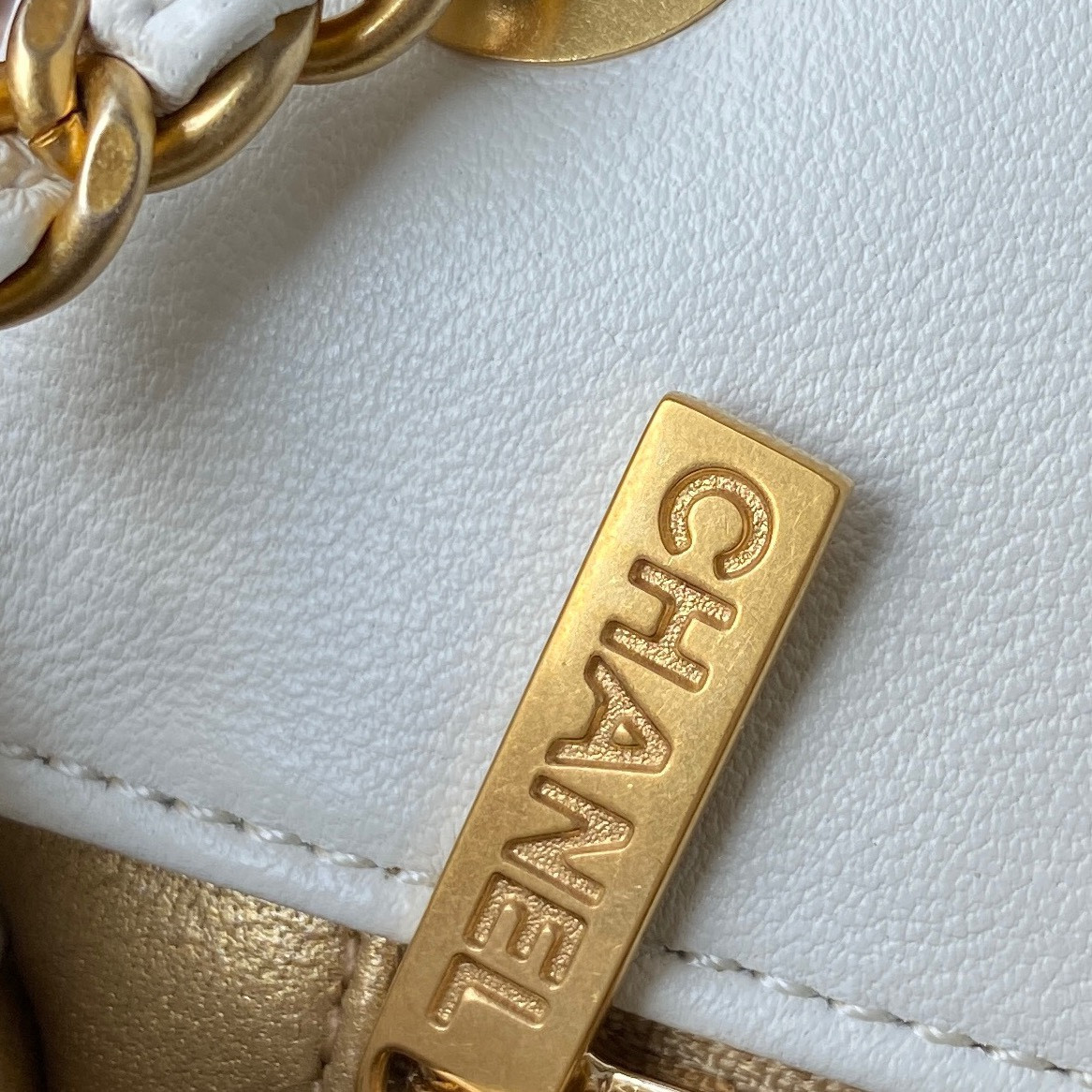 Ch*el mini flap bag shiny calfskin & gold-tone metal white 4.7 × 7.8 × 2.3 in