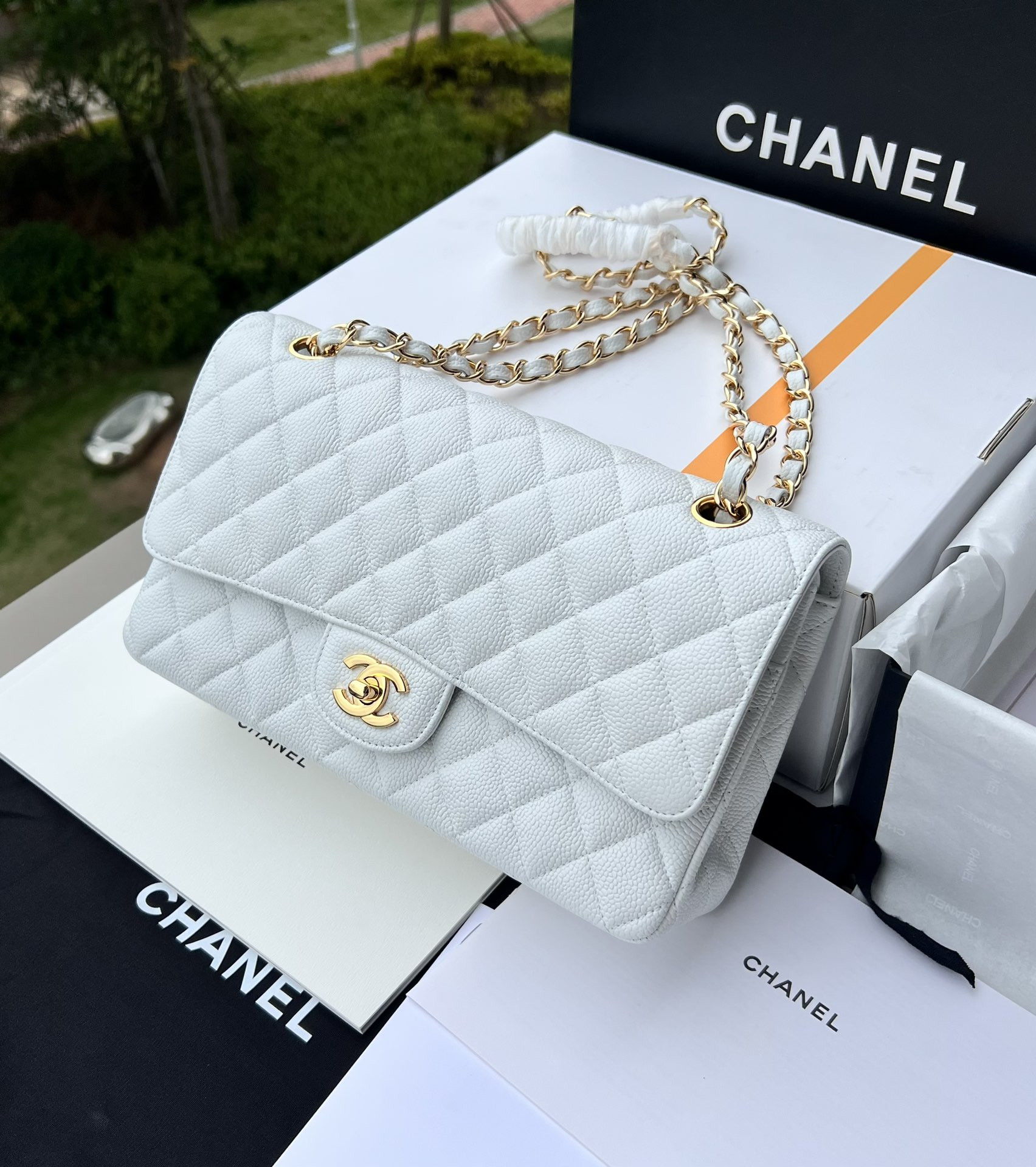 Ch*el classic handbag grained calfskin & gold-tone metal white 6 × 9.9 × 2.5 in