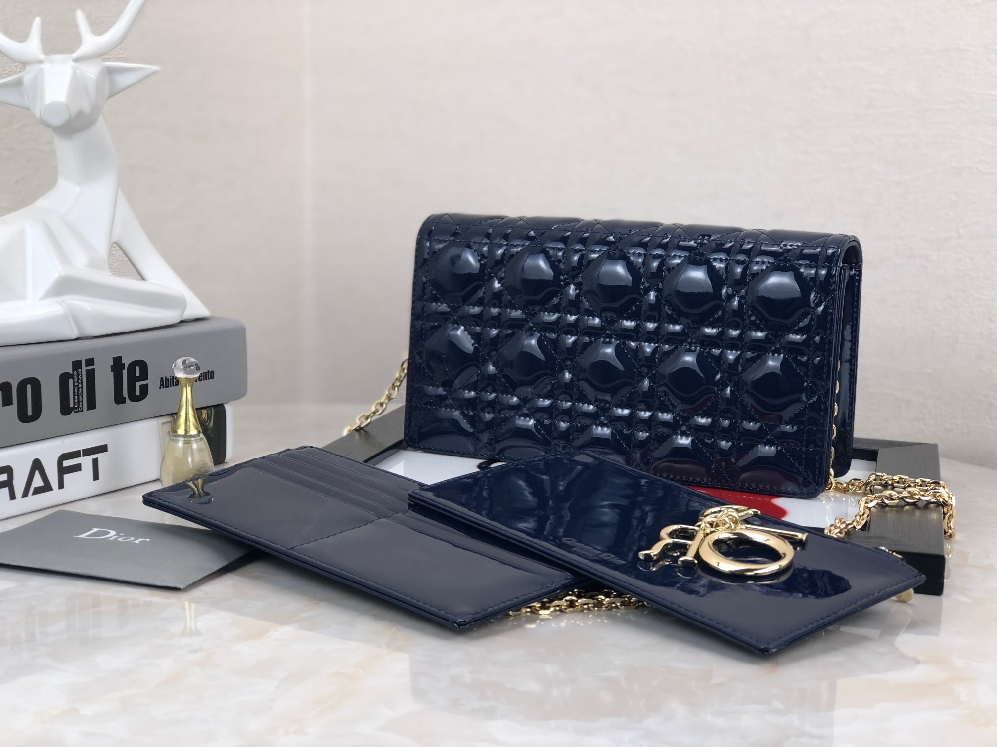 lady D*or pouch  navy patent cannage calfskin 8.5 x 4.5 x 1 inches