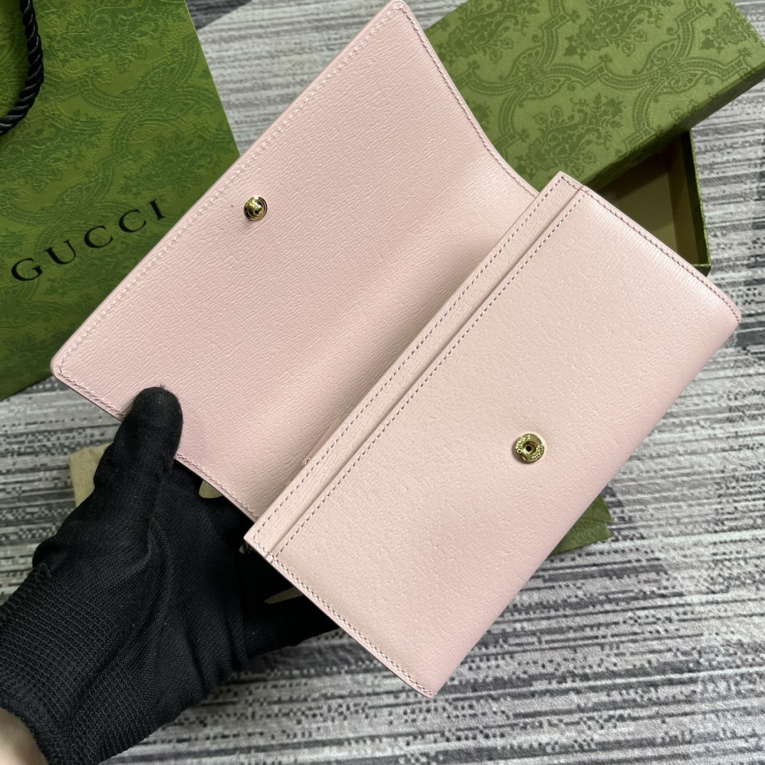 continental wallet with G*u*i script pink 7.5"w x 4"h x 1.4"d