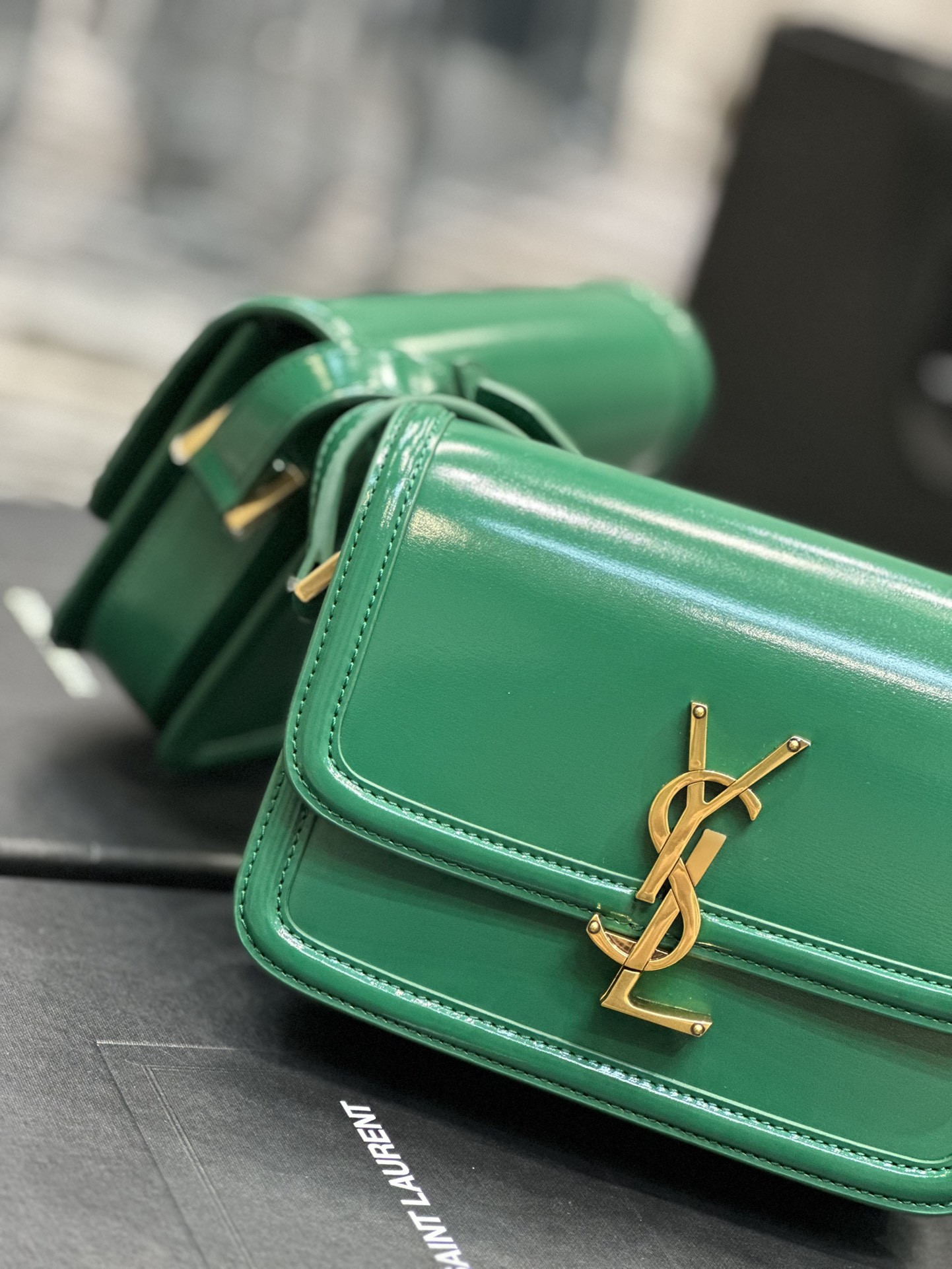 y*l solferino small satchel in box Sa**t Lau*nt green 7.4 x 5.1 x 1.9 inches