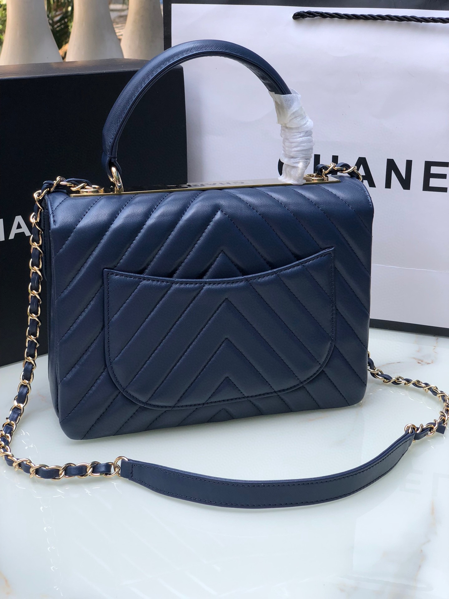 Ch*el flap bag with top handle navy 6.6 × 9.8 × 4.7 in