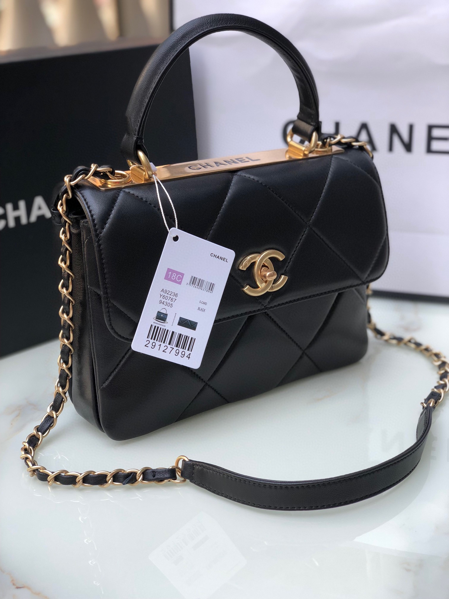 Ch*el flap bag with top handle 6.6 × 9.8 × 4.7 in