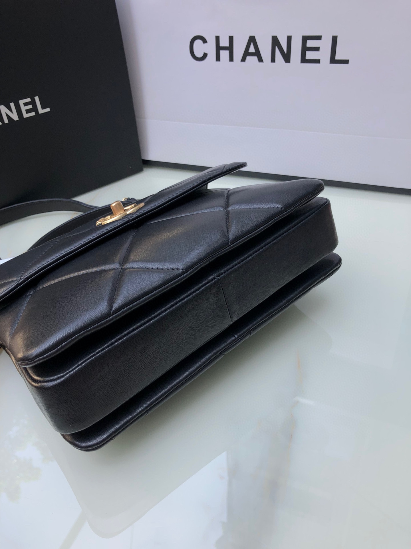 Ch*el flap bag with top handle 6.6 × 9.8 × 4.7 in