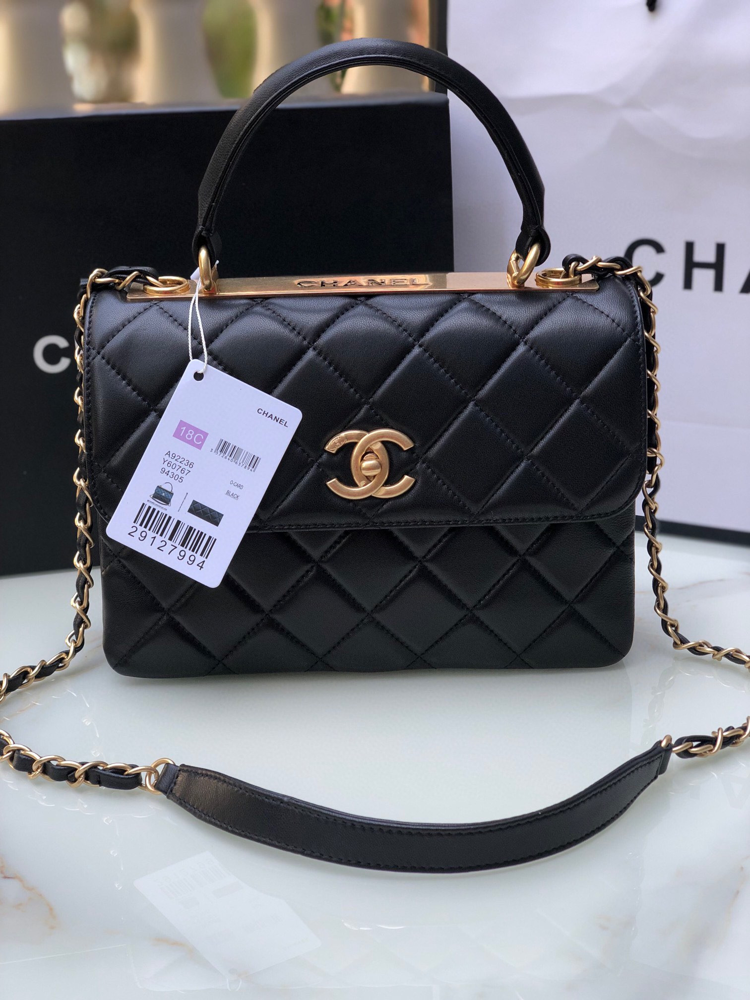 Ch*el flap bag with top handle 6.6 × 9.8 × 4.7 in