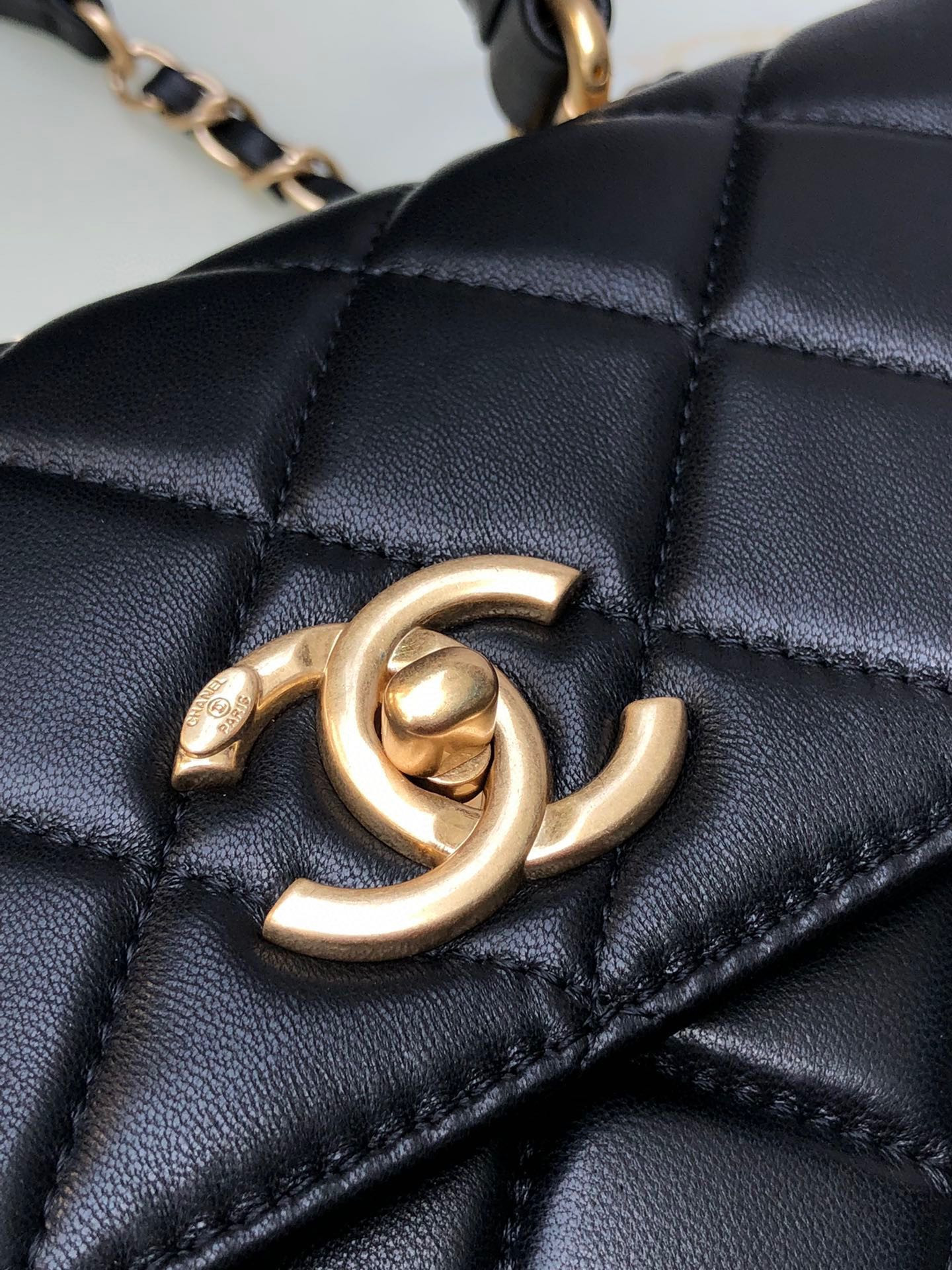 Ch*el flap bag with top handle 6.6 × 9.8 × 4.7 in