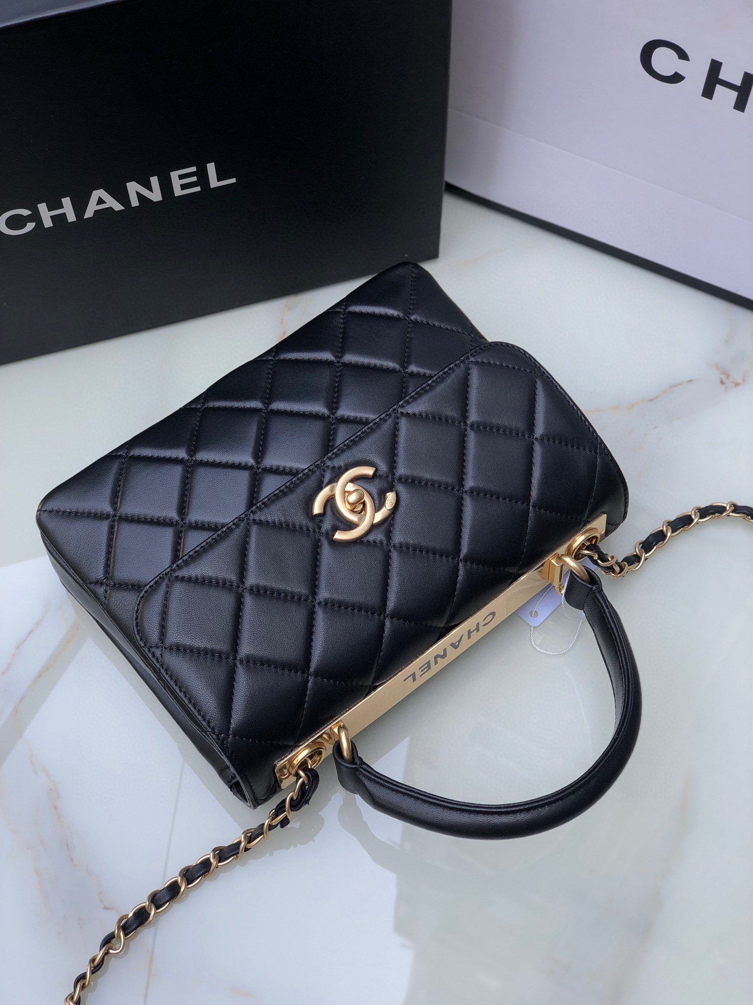 Ch*el flap bag with top handle 6.6 × 9.8 × 4.7 in