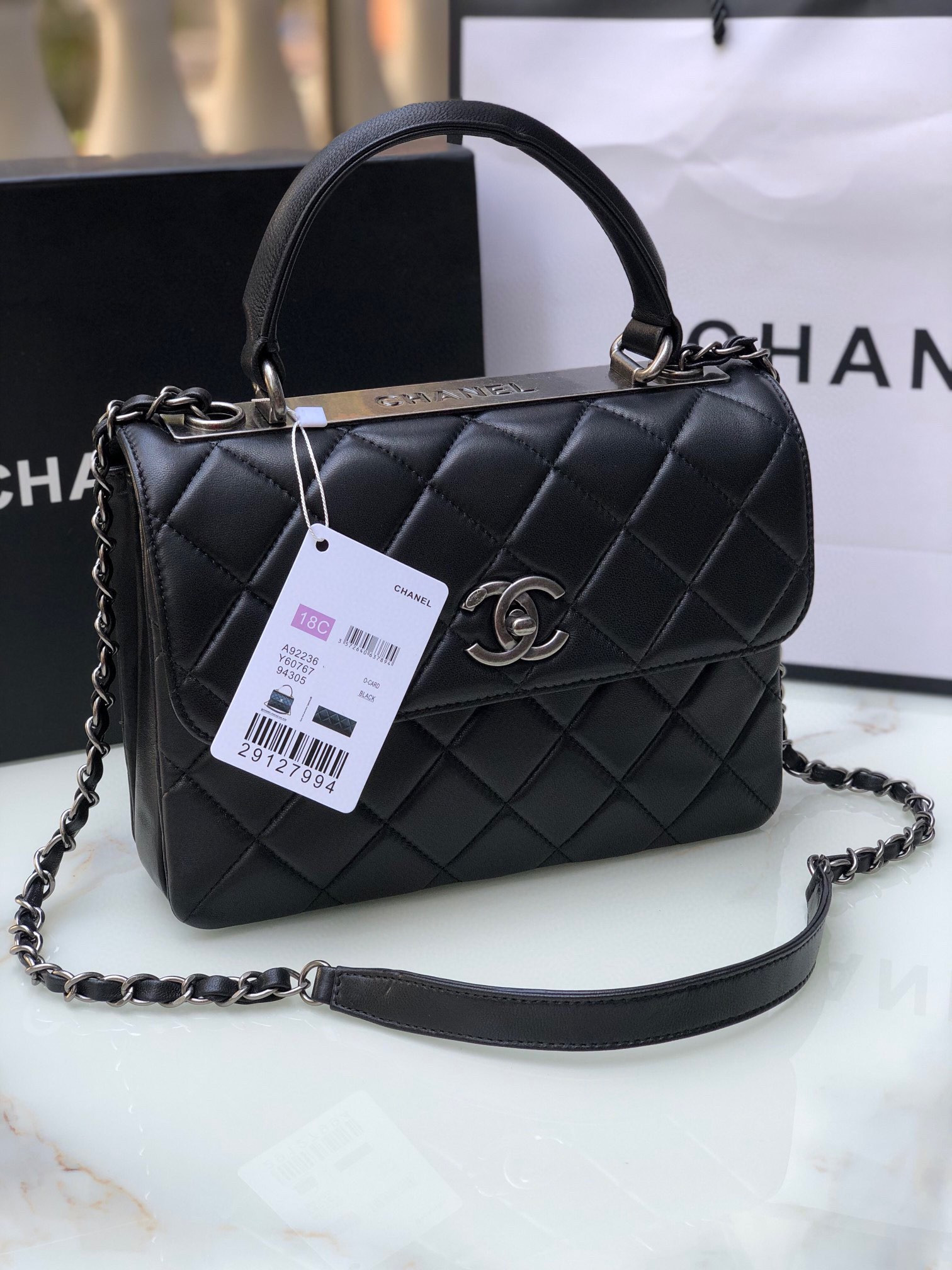Ch*el flap bag with top handle 6.6 × 9.8 × 4.7 in