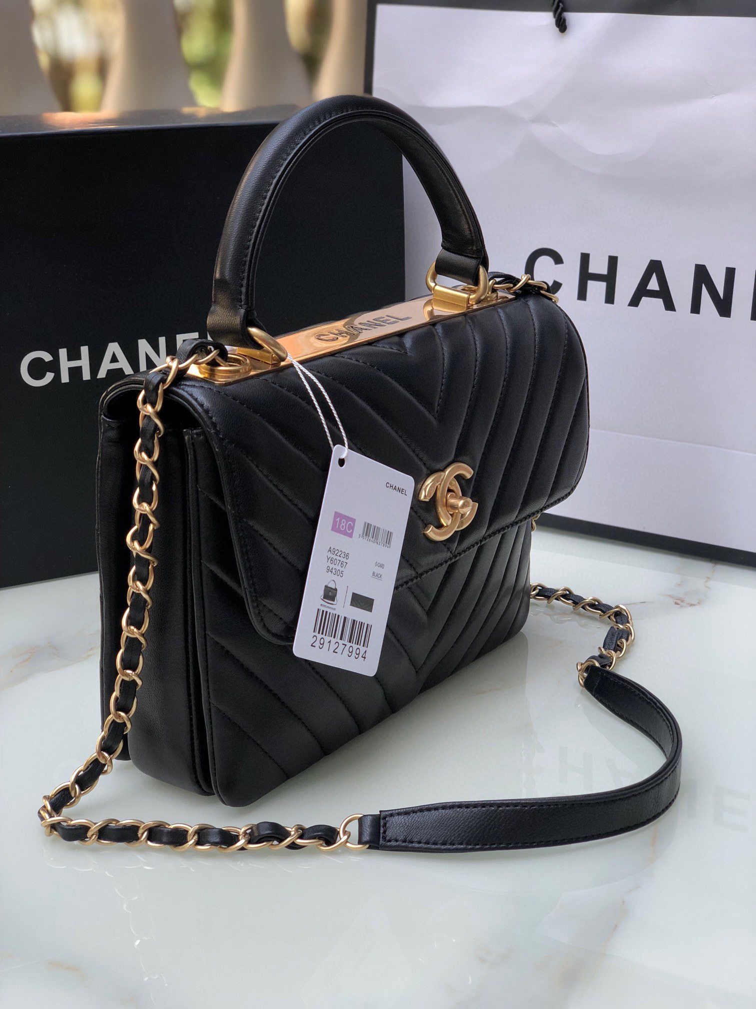 Ch*el flap bag with top handle 6.6 × 9.8 × 4.7 in