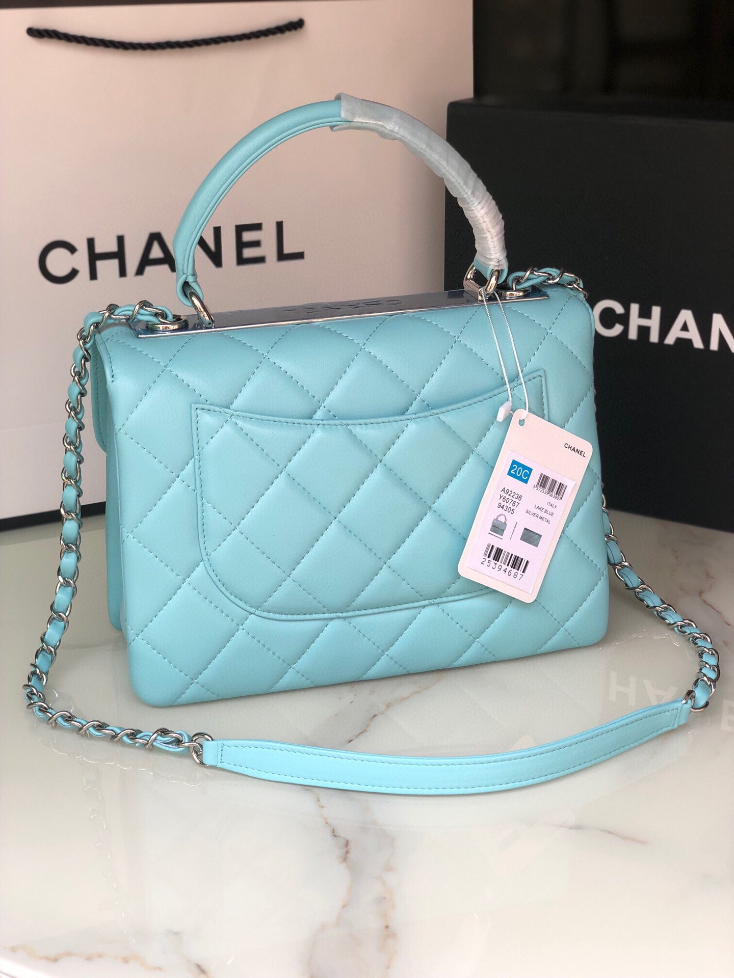 Ch*el flap bag with top handle 6.6 × 9.8 × 4.7 in
