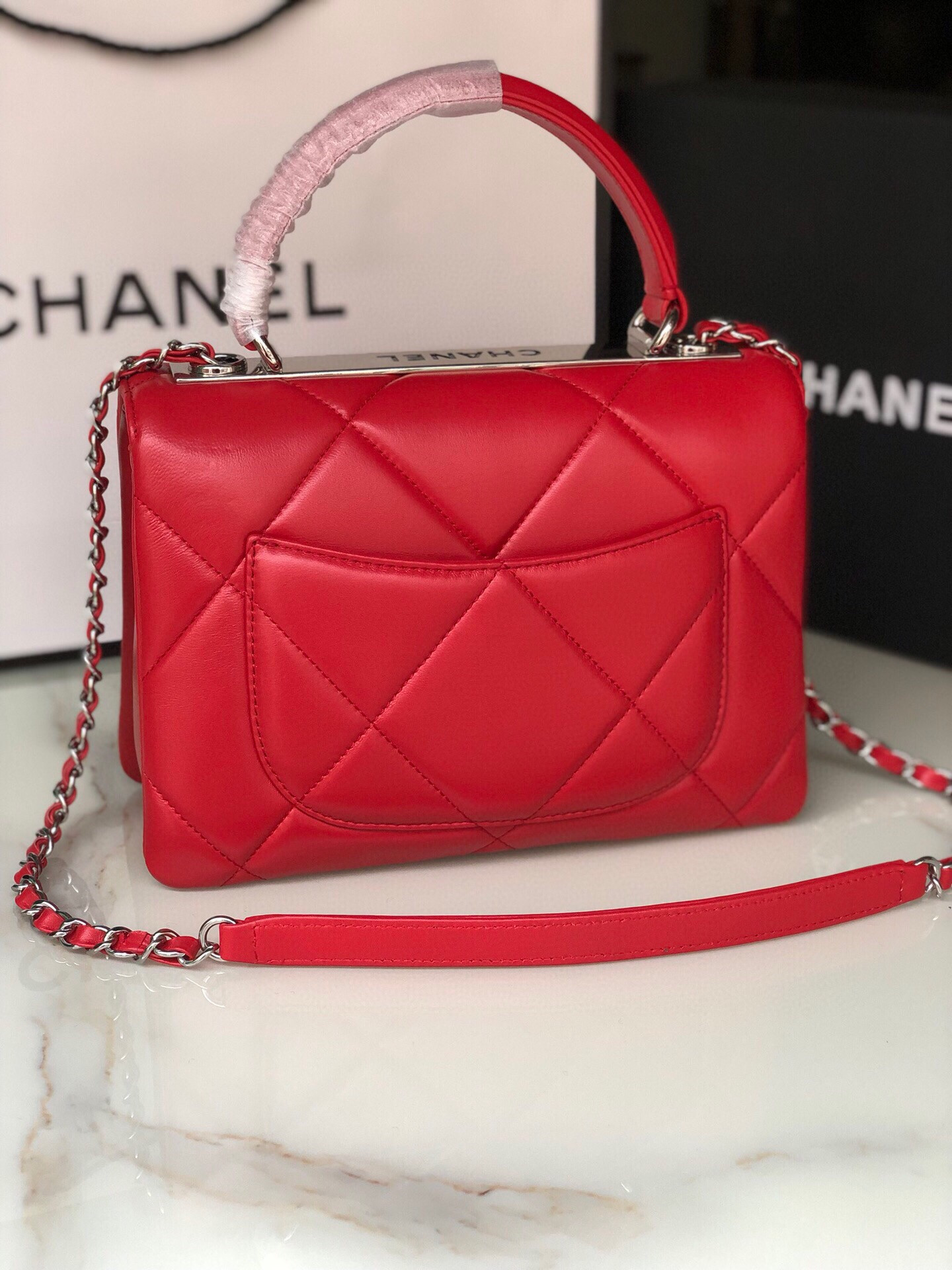 Ch*el flap bag with top handle 6.6 × 9.8 × 4.7 in