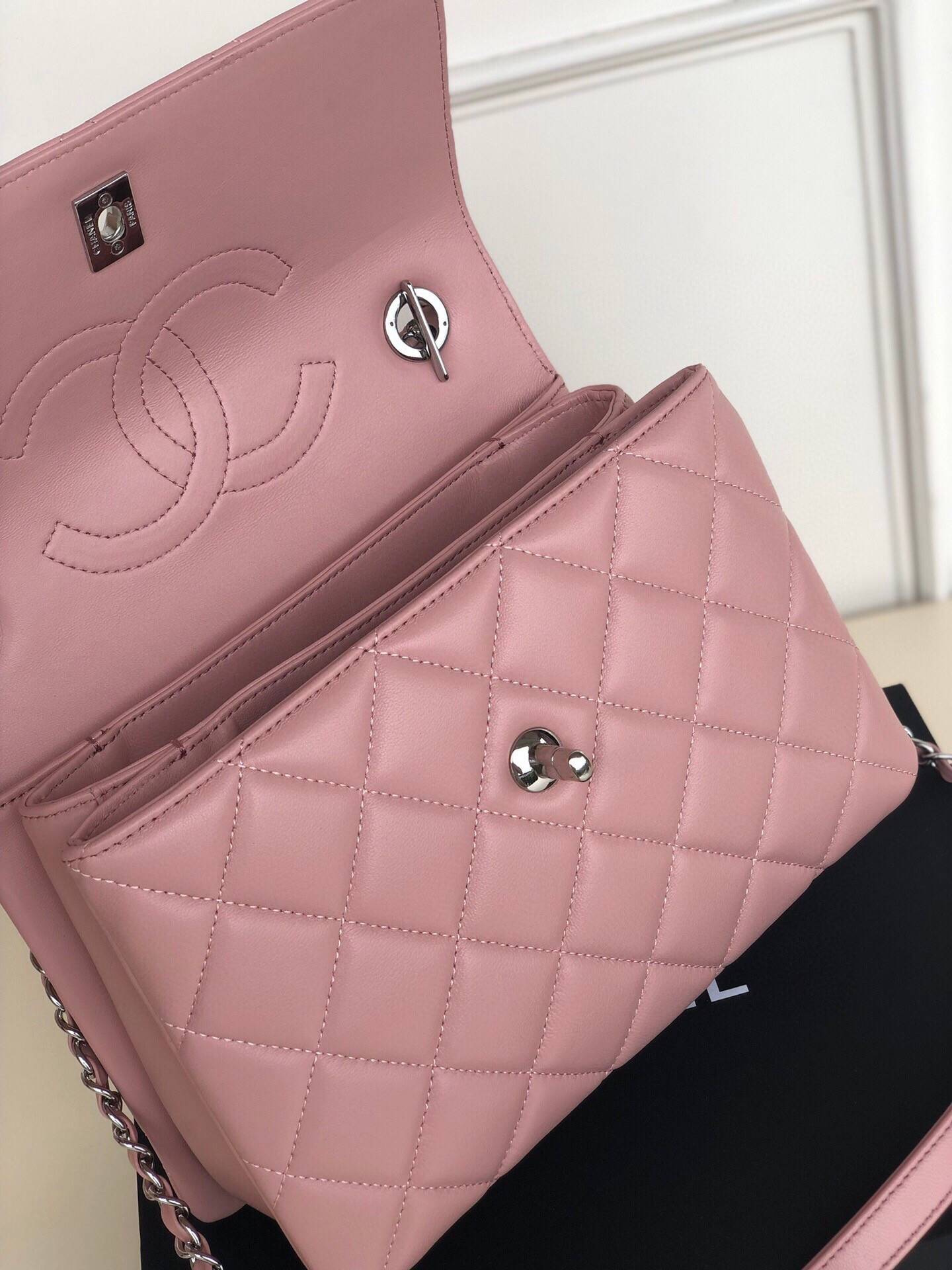 Ch*el flap bag with top handle 6.6 × 9.8 × 4.7 in