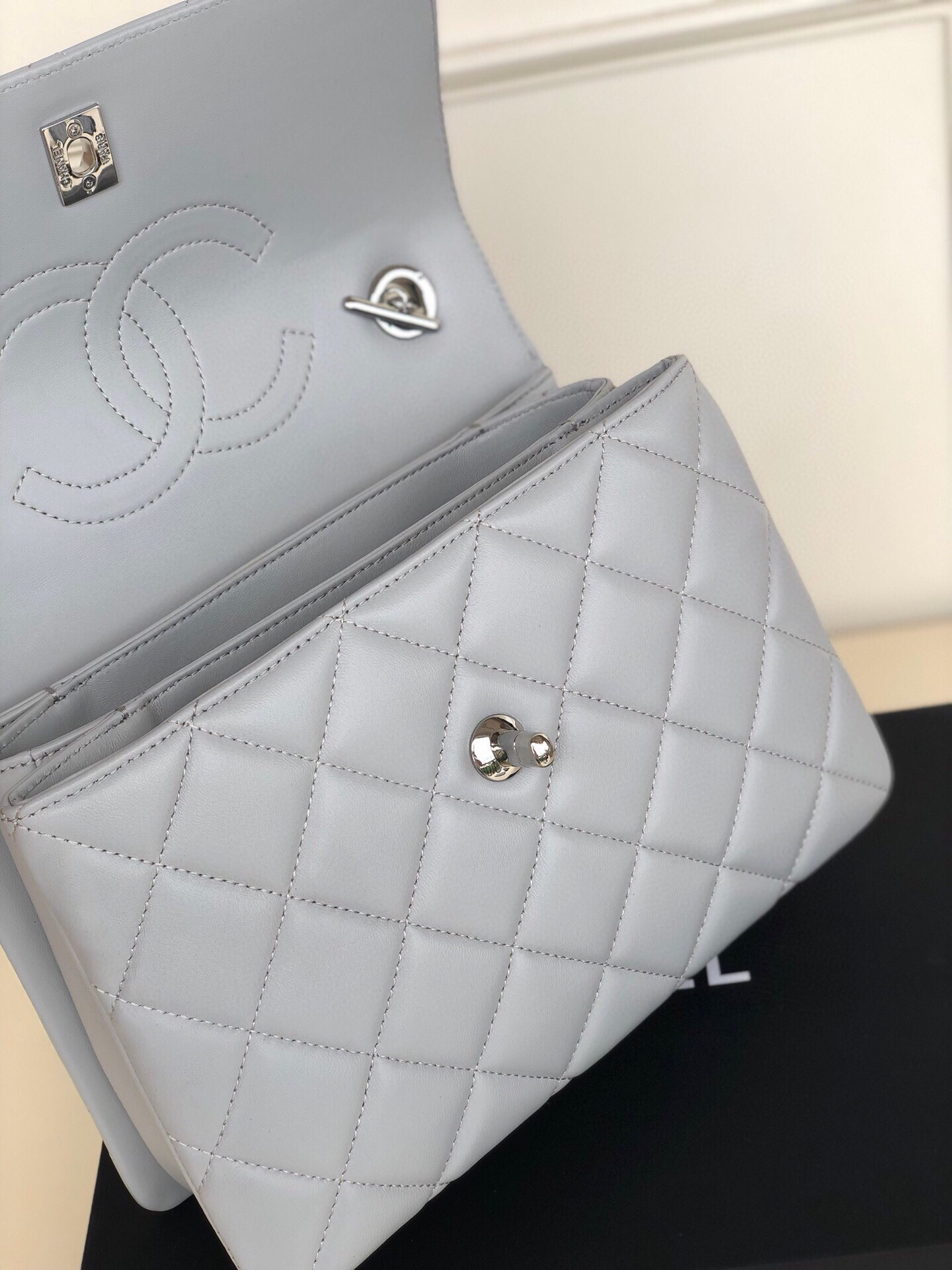 Ch*el flap bag with top handle 6.6 × 9.8 × 4.7 in