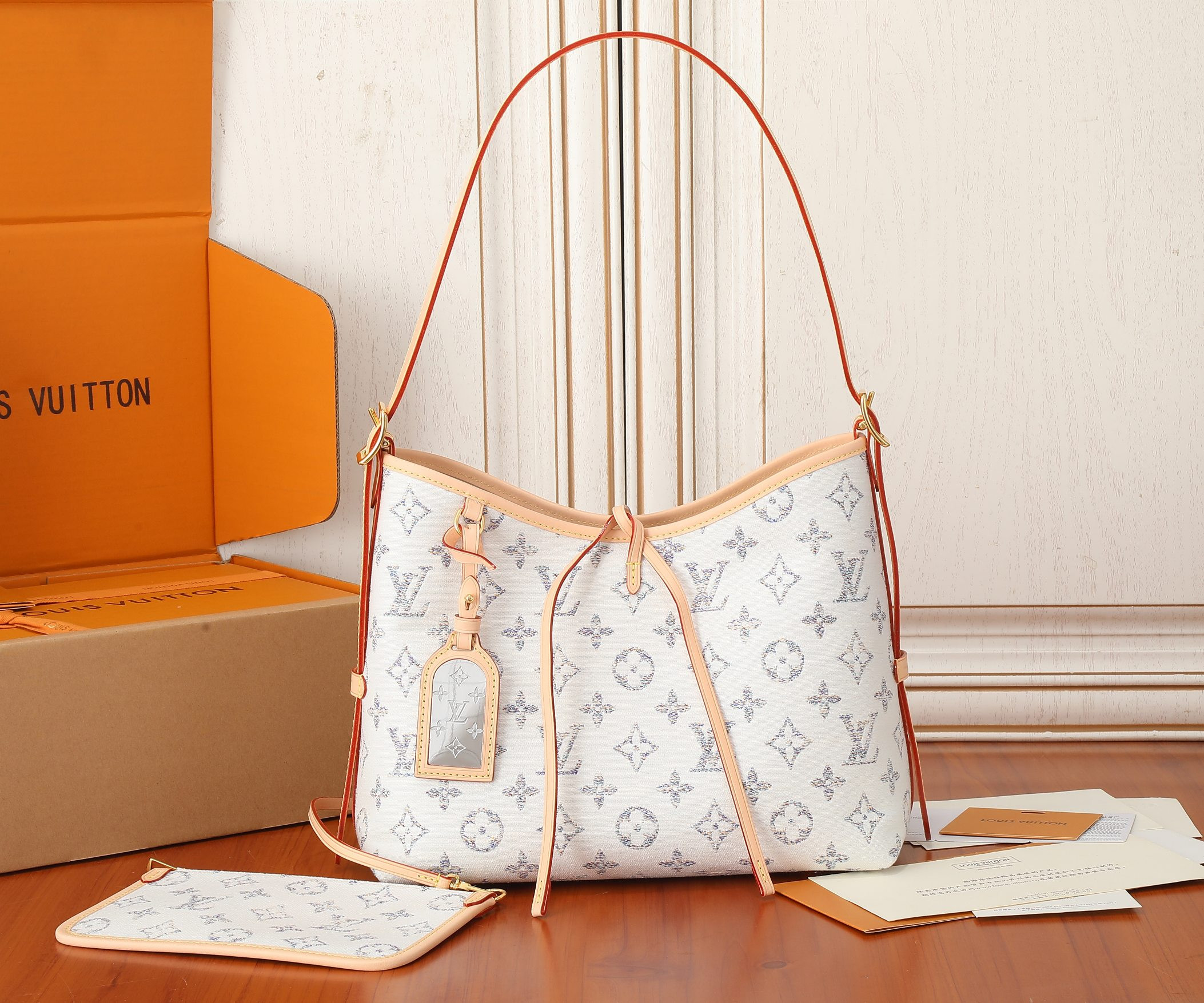 LV CarryAll PM M24707 11.6x9.4x4.7 inches