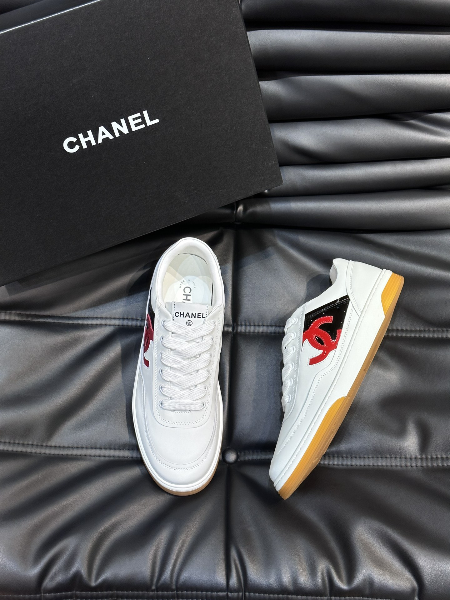 ua Ch*el sneaker calfskin