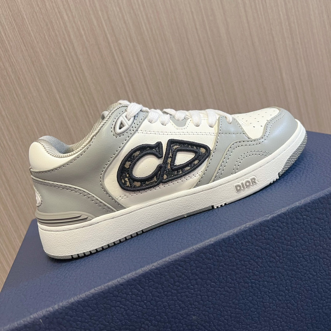 ua D*or b57 low-top sneaker gray and white